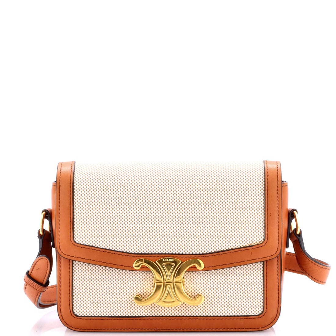 Canvas leather shoulder bag for teens.: Canvas leather shoulder bag for teens. The Celine Triomphe shoulder bag features a unique combination of canvas and leather materials, with a classic cross body design. Measuring 6" tall, 7.5" wide, a