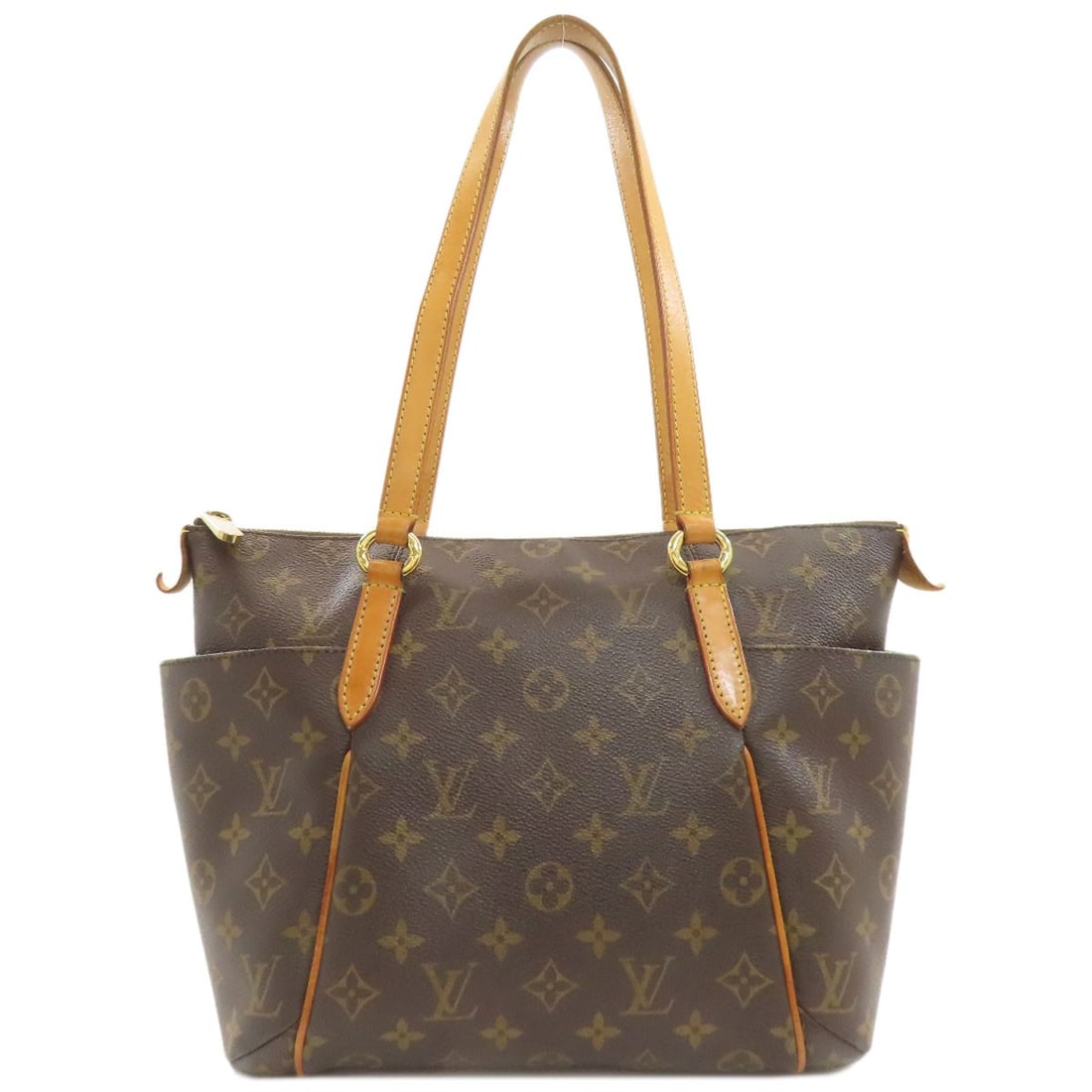 Tote bag monogram canvas: Tote bag monogram canvas Tote bag monogram canvas in classic brown. This LOUIS VUITTON tote features exterior material made of monogram canvas, a distinctive design element of the brand's style. The b