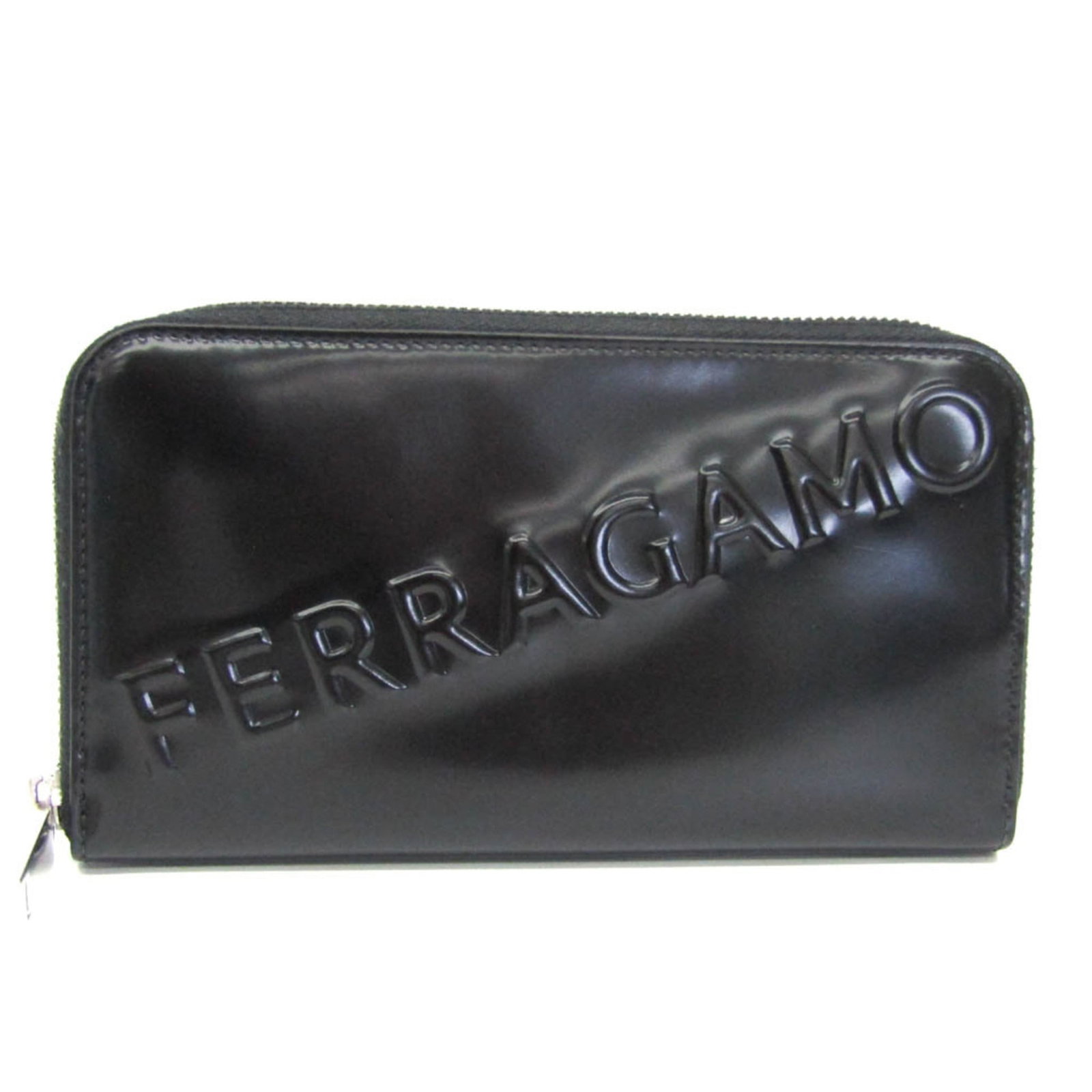 Salvatore Ferragamo Long Wallet (Bi-Fold) Leather: Salvatore Ferragamo Long Wallet (Bi-Fold) Leather The Salvatore Ferragamo Long Wallet (Bi-Fold) Leather features embossed leather and a zipper closure for secure organization. Its spacious interior