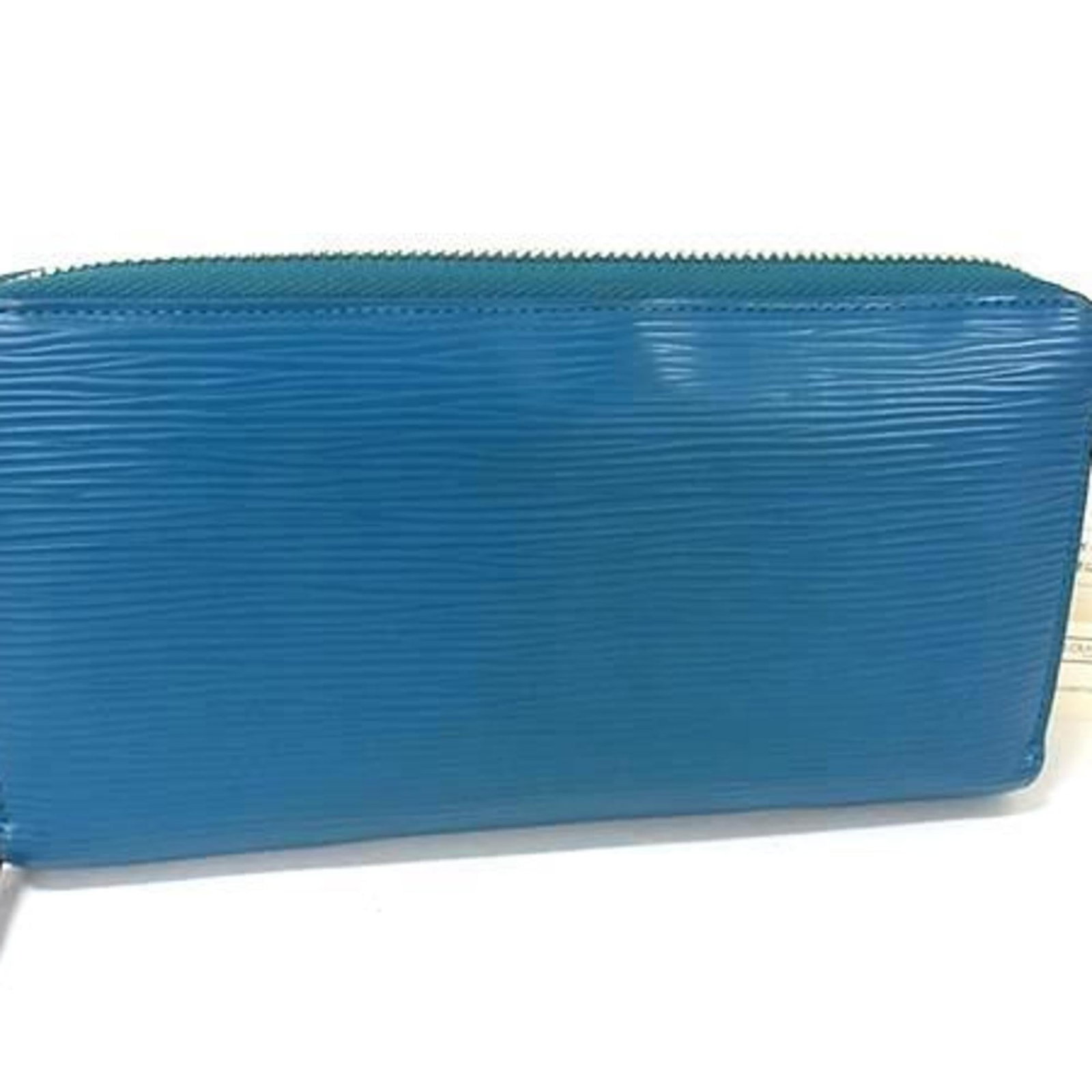 Louis Vuitton Long Bill Wallet (Bi-Fold) Leather: Louis Vuitton Long Bill Wallet (Bi-Fold) Leather The Louis Vuitton Long Bill Wallet (Bi-Fold) Leather features a classic design with a cyan color, measuring 10.5cm x 19.5cm x 2.5cm. This bi-fold walle