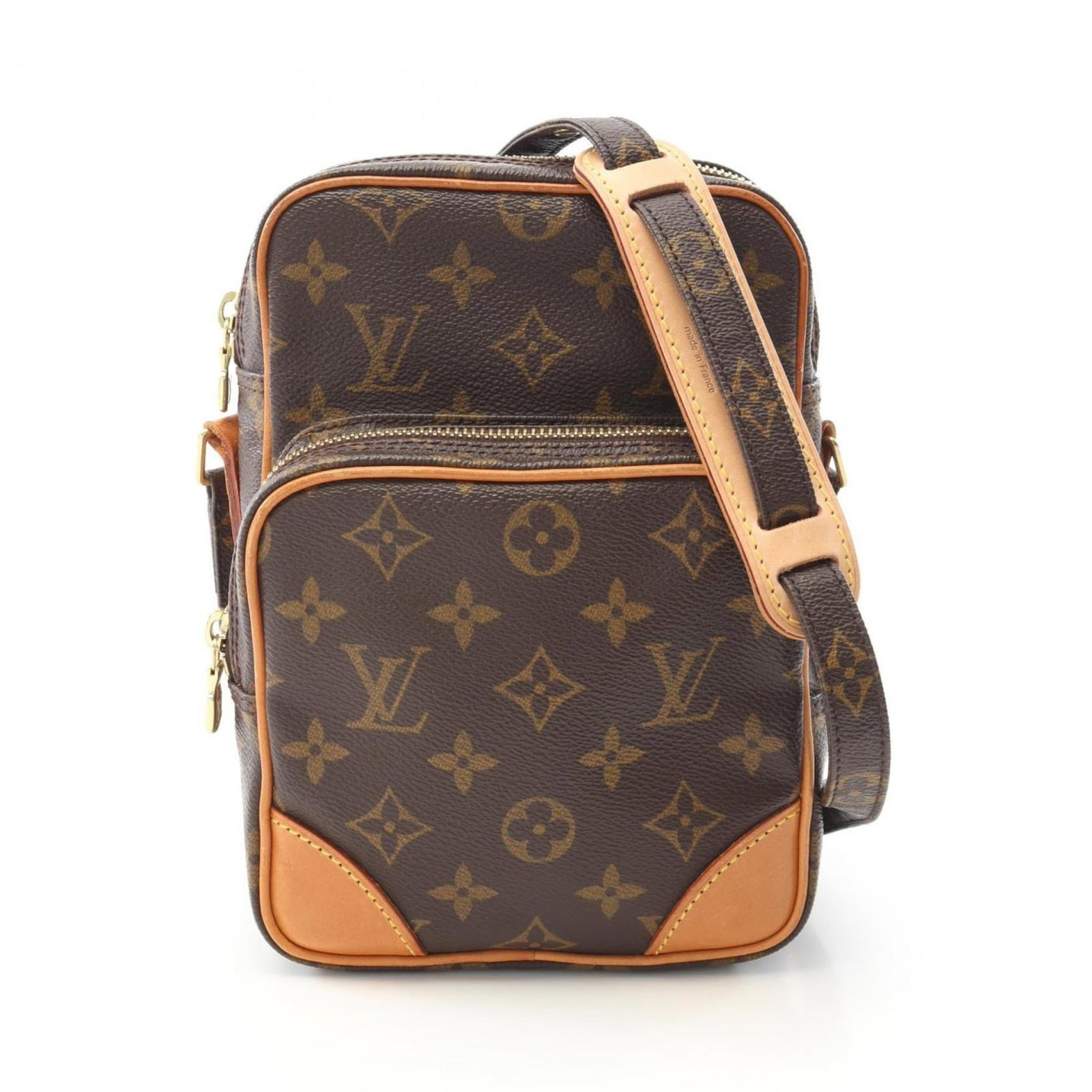 Louis Vuitton Shoulder Bag Coated Canvas Leather: Louis Vuitton Shoulder Bag Coated Canvas Leather Coated canvas and leather come together in this iconic Louis Vuitton shoulder bag, featuring a classic design with a timeless brown hue. The bag's