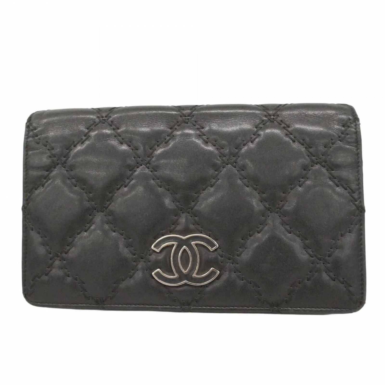 Chanel Long Wallet (Bi-Fold) Leather: Chanel Long Wallet (Bi-Fold) Leather The Chanel Long Wallet (Bi-Fold) Leather features a classic design with lambskin material and a timeless black color. With its bi-fold structure and compact size, 
