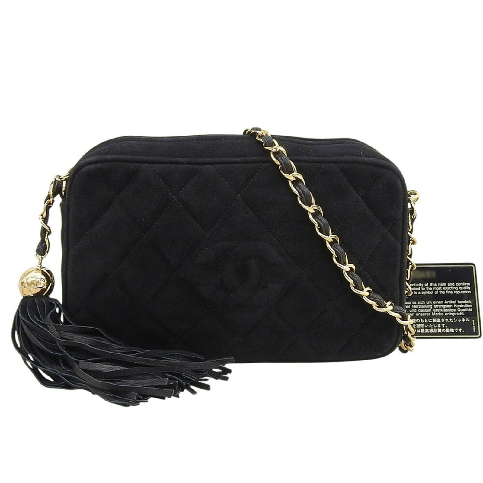 Chanel Shoulder Bag Suede: Chanel Shoulder Bag Suede Suede perfection in black. This Chanel shoulder bag features a classic design with a few traces of usage, some scratches and dirt visible, yet overall in very good condition.