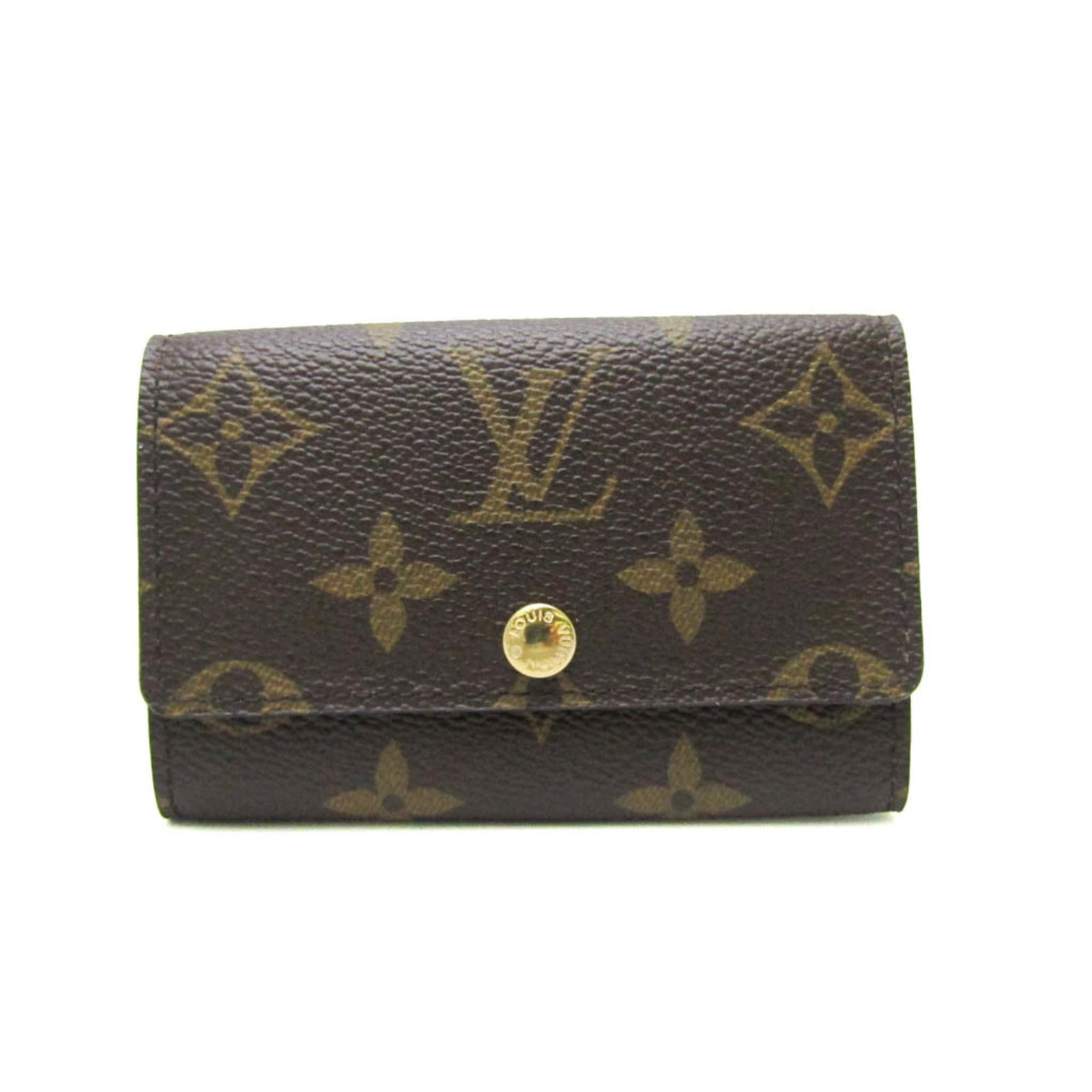 Louis Vuitton Keycase Monogram: Louis Vuitton Keycase Monogram Monogrammed for style and functionality, this Louis Vuitton Keycase features a classic snap closure and six key hooks. The iconic monogram pattern adds a touch of luxury