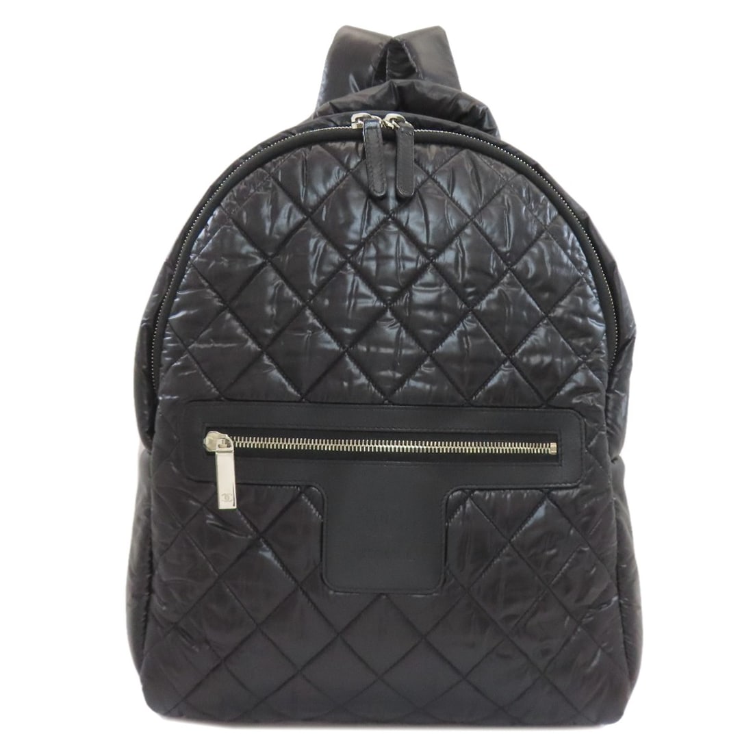 Cococoon nylon backpack daypack: Cococoon nylon backpack daypack Black nylon backpack with A* daypack style. This CHANEL-designed bag features exterior material made from high-quality nylon and boasts a sleek black color. Item Specif