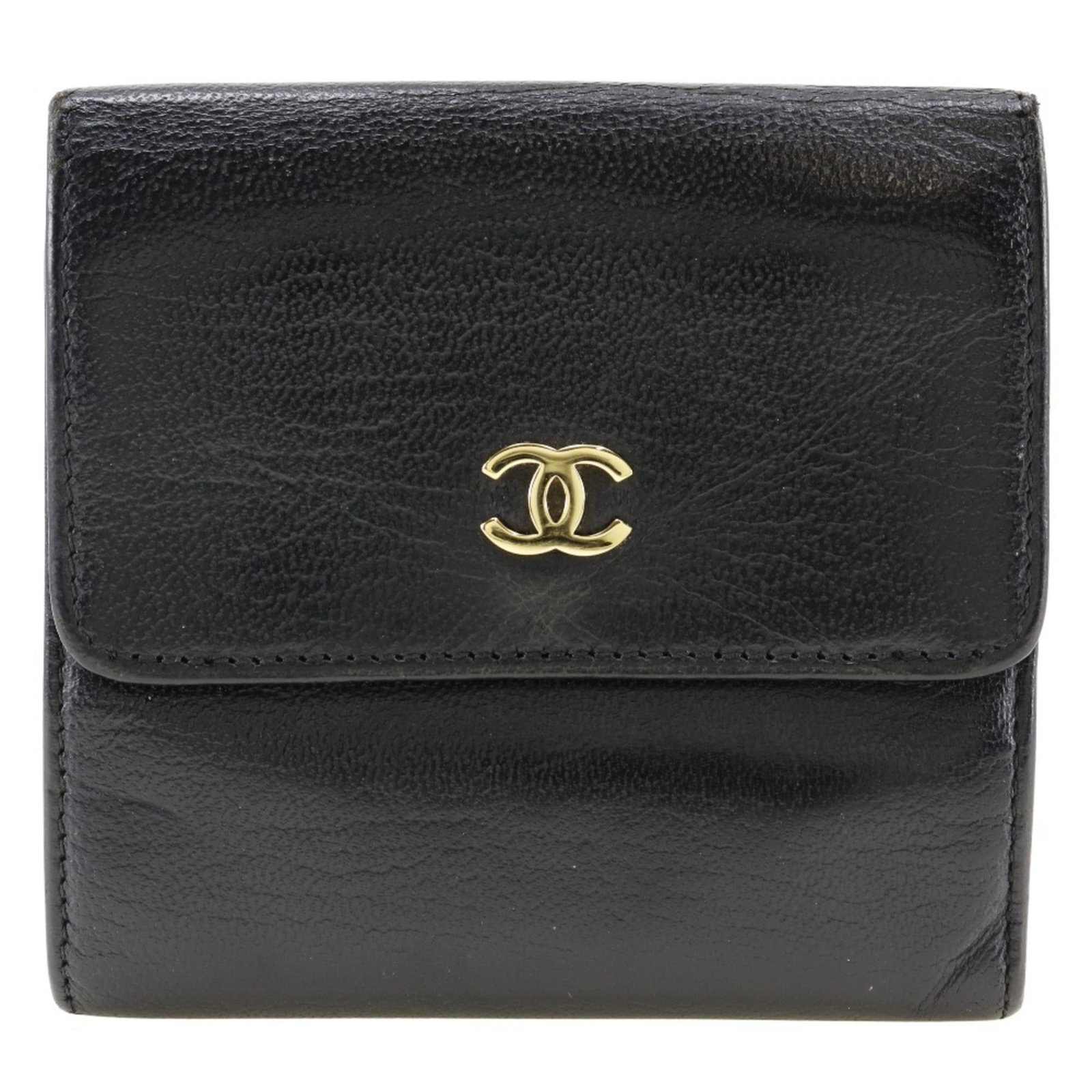 Chanel Wallet (Bi-Fold) Leather: Chanel Wallet (Bi-Fold) Leather This classic Chanel bi-fold leather wallet features a timeless design with a snap fastener closure and multiple inner pockets for organization. Made from high-quality