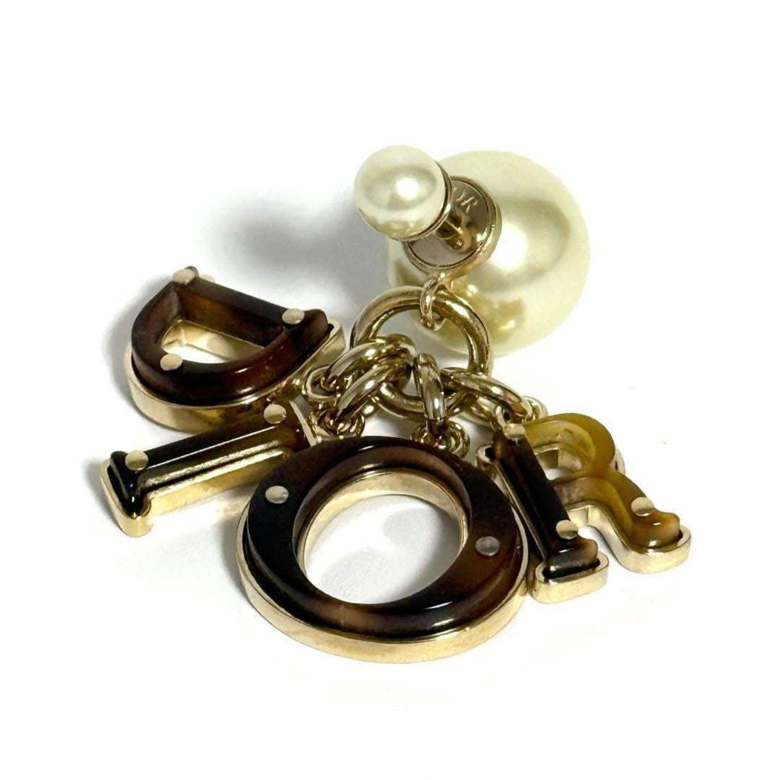 Christian Dior Drop Earrings Artificial Pearl Metal Plastic: Christian Dior Drop Earrings Artificial Pearl Metal Plastic Christian Dior's iconic drop earrings feature artificial pearls and metal construction. The used condition reveals some minor scratches and 