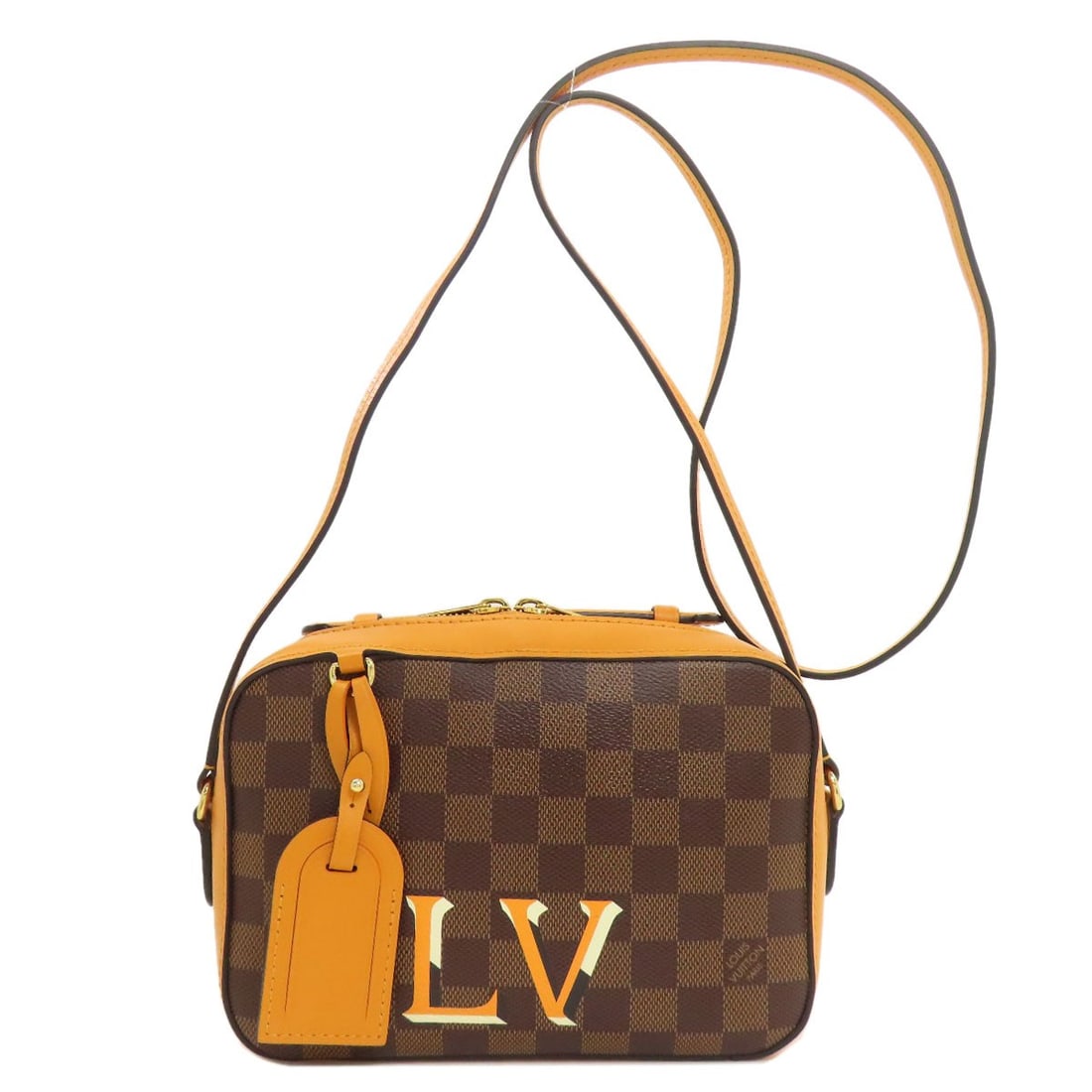 Damier canvas shoulder bag: Damier canvas shoulder bag The LOUIS VUITTON Damier canvas shoulder bag boasts its iconic Ebene x Saffron exterior color and classic design. Made from high-quality damier canvas, this timeless piece f