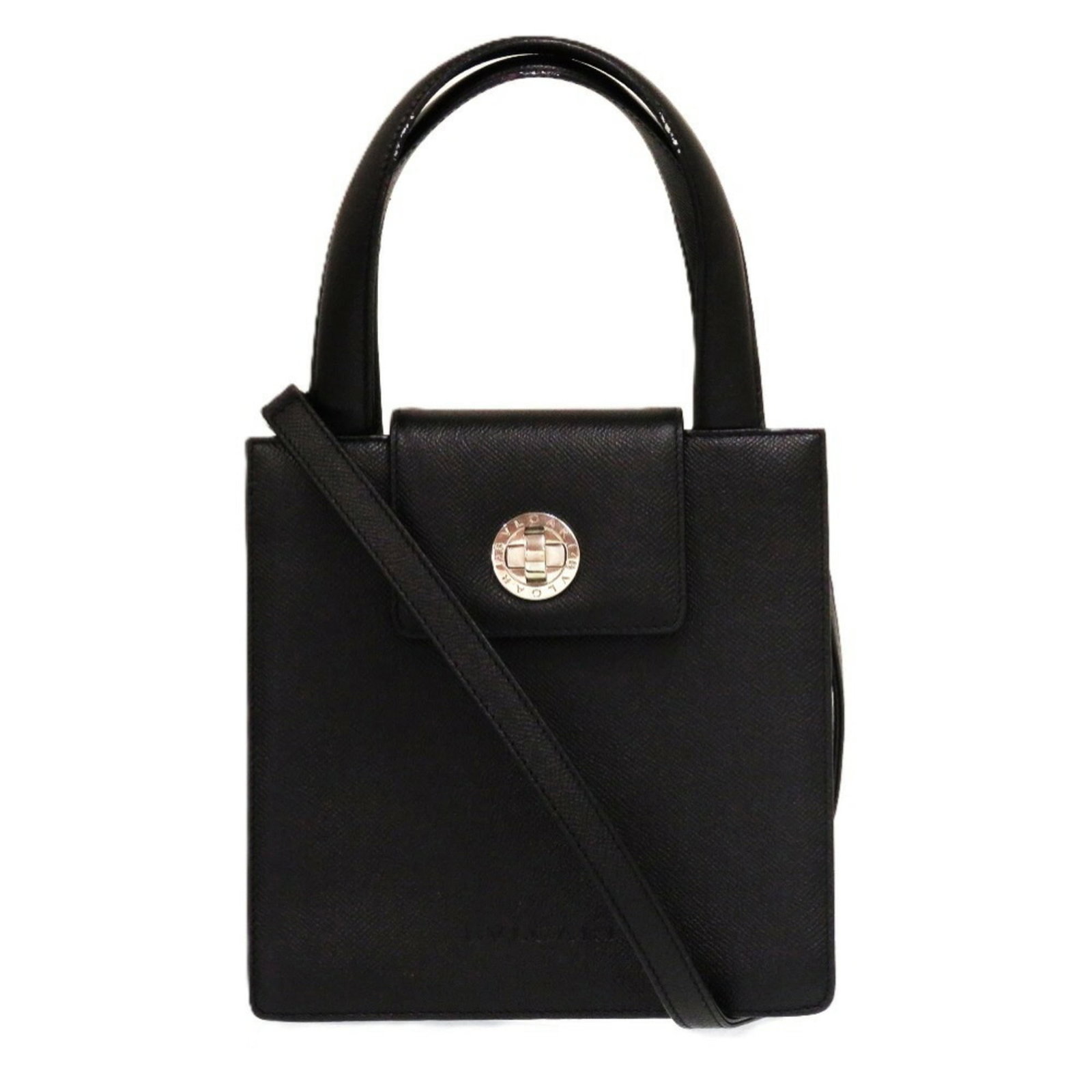 Bvlgari Handbag Leather: Bvlgari Handbag Leather The Bvlgari Handbag Leather is a sleek and sophisticated accessory, featuring high-quality black leather construction with visible traces of usage. Measuring 20cm x 20cm x 7.5c