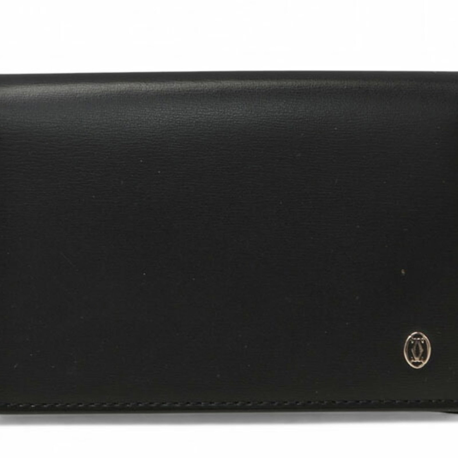 Cartier Card Case: Cartier Card Case Cartier Card Case in Black - A sleek and understated accessory. Made from high-quality materials, this card case features a clear design with a subtle black finish. In very good cond