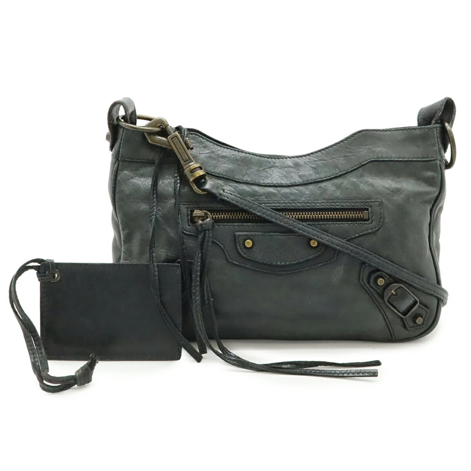 Balenciaga Pochette Shoulder Bag Leather: Balenciaga Pochette Shoulder Bag Leather The Balenciaga Pochette Shoulder Bag Leather features a dark green leather exterior with a classic shoulder strap design. This used bag has a weight of 310g