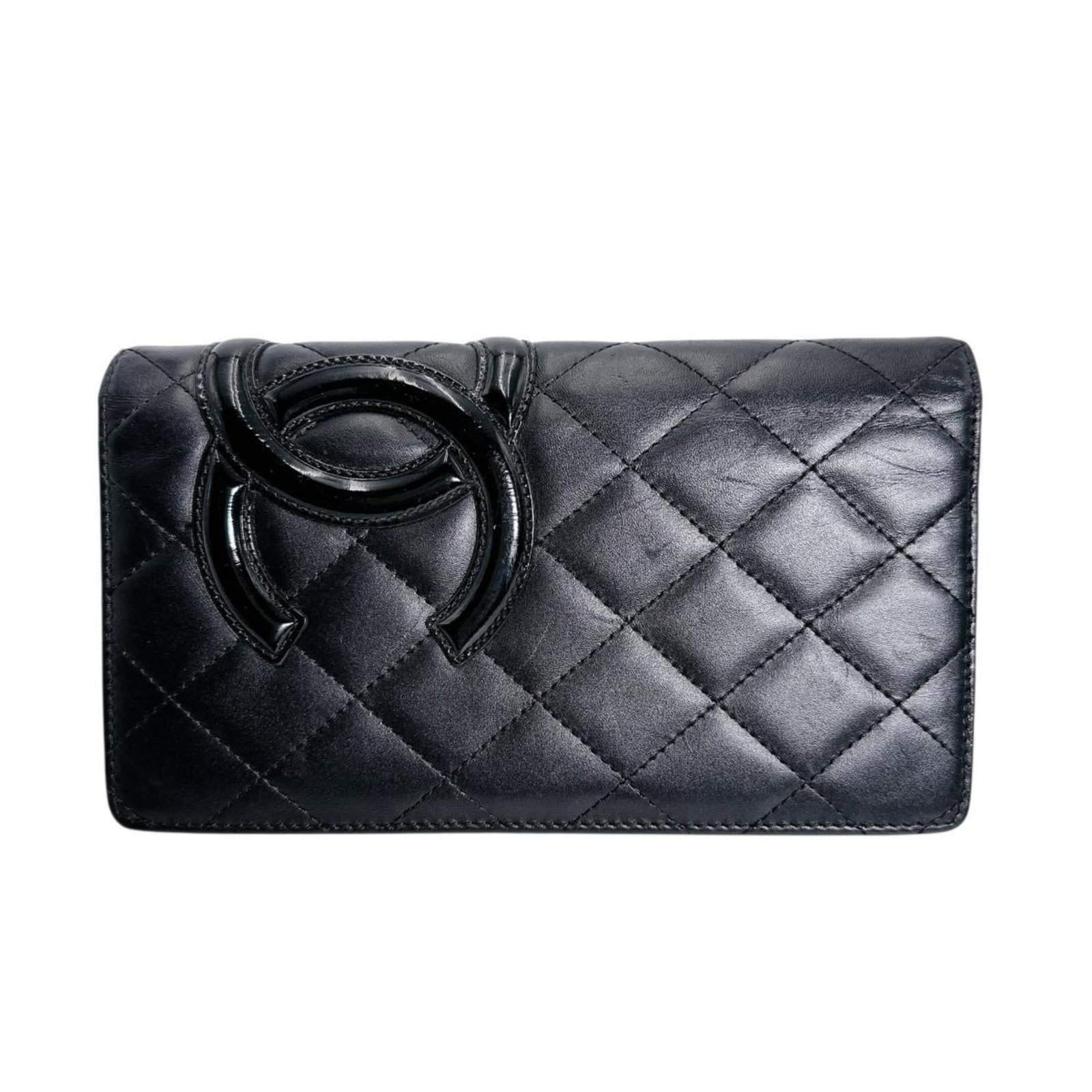 Chanel Long Wallet (Bi-Fold) Leather: Chanel Long Wallet (Bi-Fold) Leather The Chanel Long Wallet (Bi-Fold) Leather is a classic design with clean lines and timeless elegance. Its black leather exterior features subtle scratches and signs
