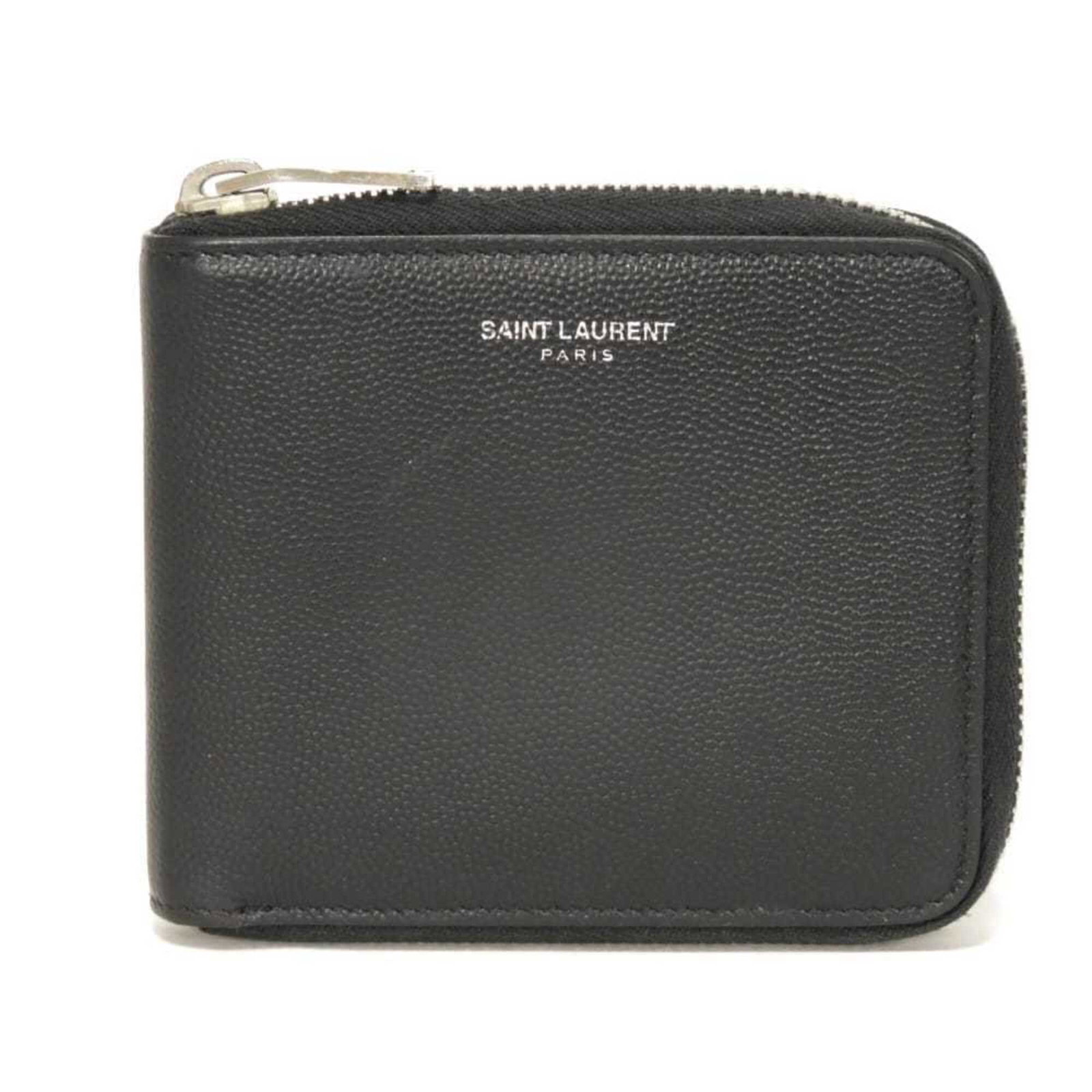 Yves Saint Laurent Wallet (Bi-Fold) Leather: Yves Saint Laurent Wallet (Bi-Fold) Leather This black bi-fold wallet from Yves Saint Laurent features embossed leather and has been used to carry essentials. Traces of usage are visible, with