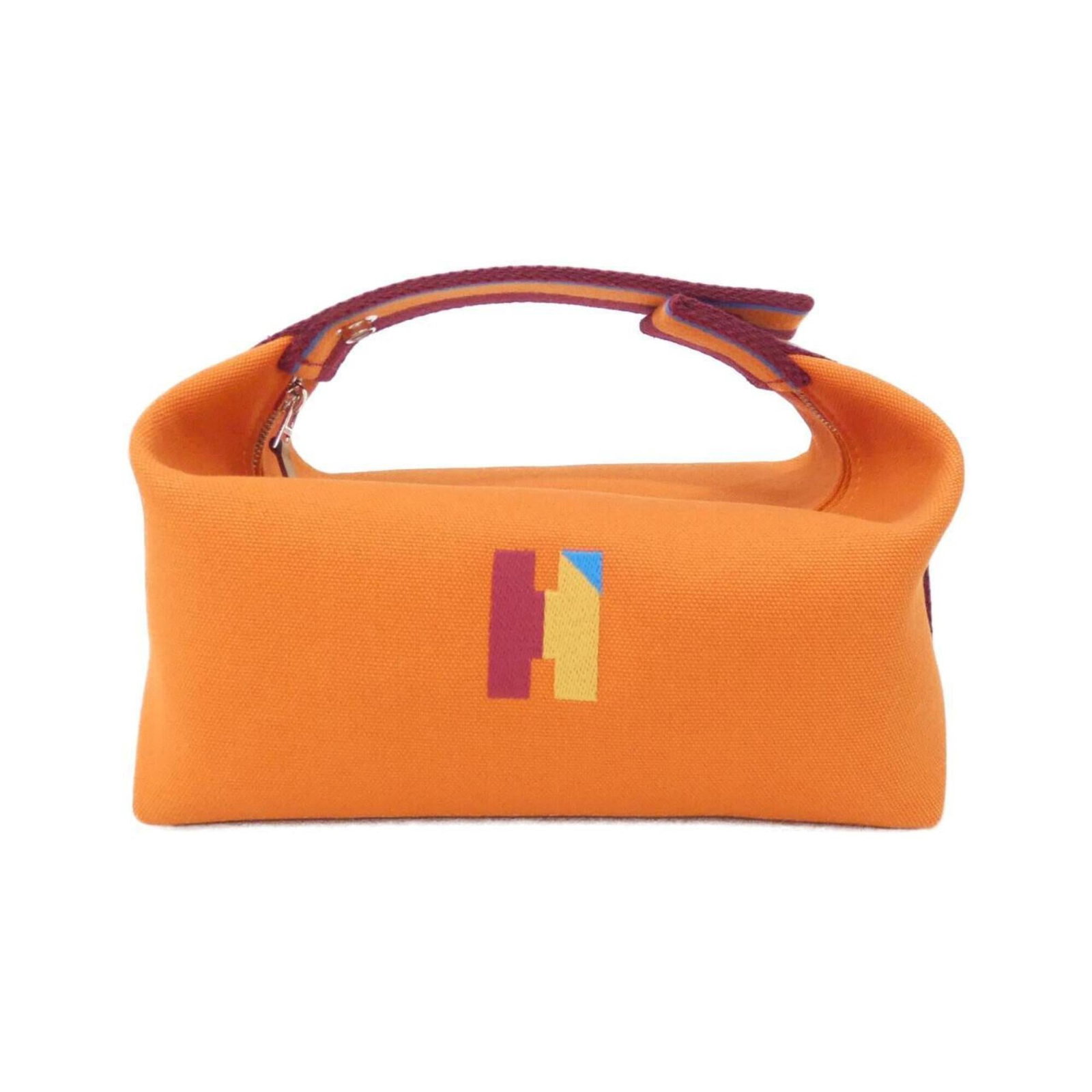 Hermes Pouch Canvas: Hermes Pouch Canvas The Hermes Pouch Canvas boasts a vibrant Feu, Orange hue, adding a pop of color to any outfit. Made from high-quality canvas, this stylish pouch features a classic design with