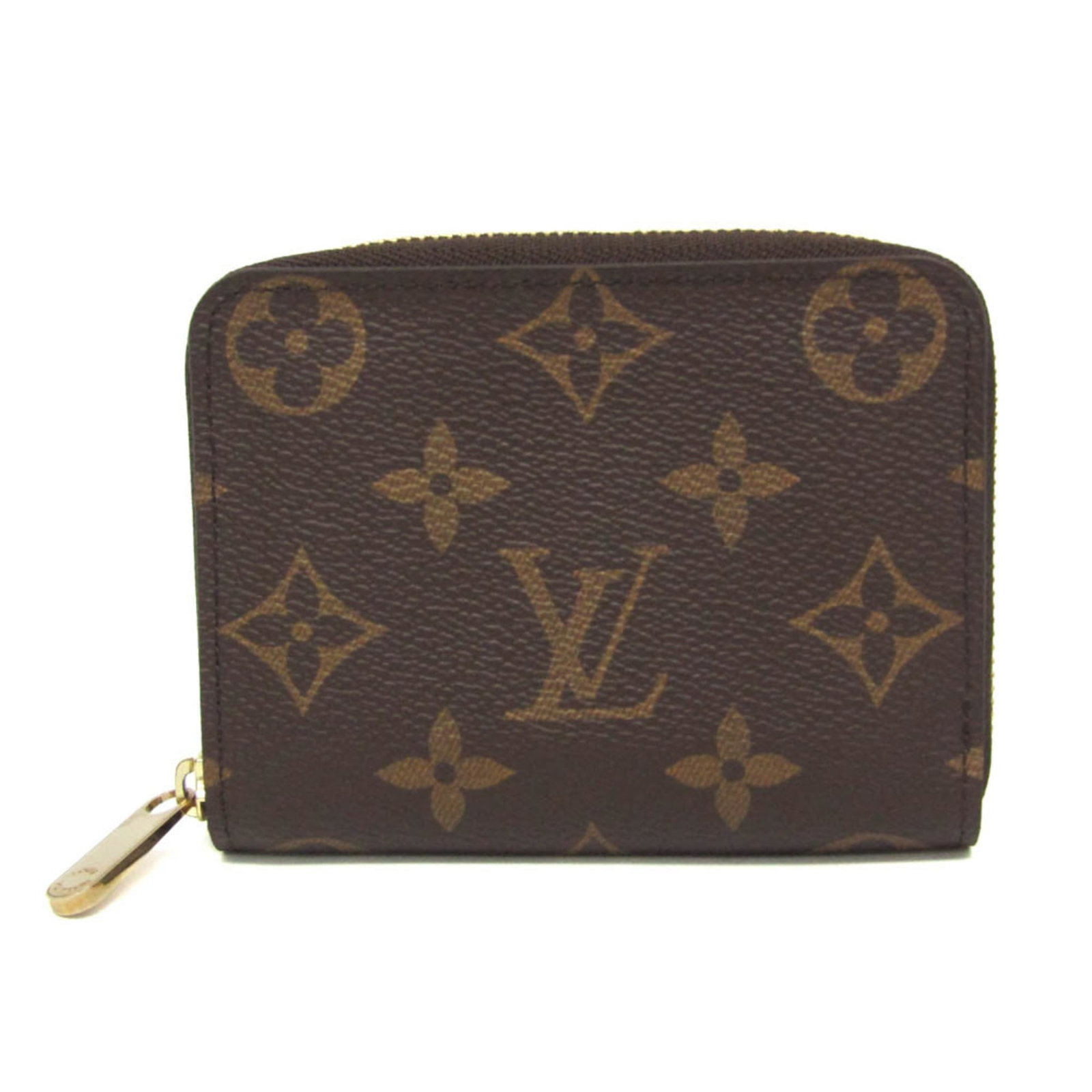 Louis Vuitton Coin Purse/Coin Case Monogram: Louis Vuitton Coin Purse/Coin Case Monogram Monogrammed with iconic Louis Vuitton style, this Coin Purse/Coin Case boasts a timeless design featuring a classic monogram closure and multiple pockets