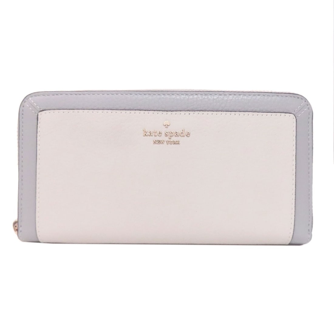 Kate Spade logo long leather wallet with coin pocket: Kate Spade logo long leather wallet with coin pocket The Kate Spade logo long leather wallet features a sleek gray exterior and boasts a coin pocket for added convenience. Its classic design makes it 