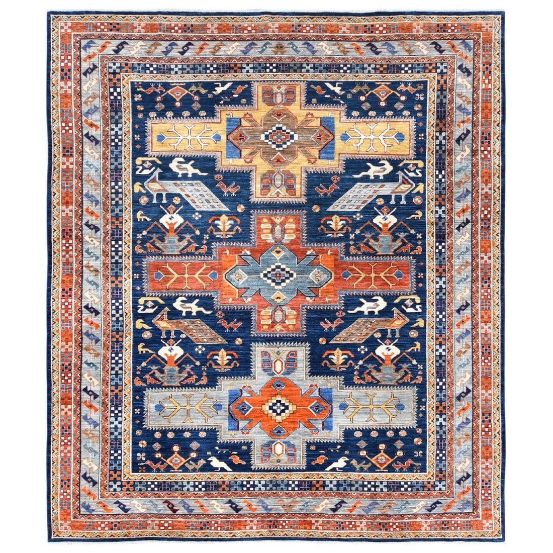 Blue wool rug inspired by Armenian design: Blue wool rug inspired by Armenian design The Blue Wool Rug boasts an intricate hand-knotted design inspired by Armenian patterns. Made from high-quality wool and featuring a striking blue field with 