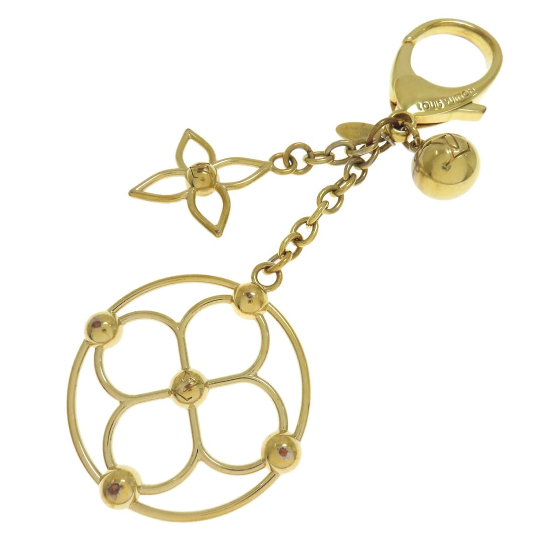 Blue Metal Me Key Ring Louis Vuitton M67931: Blue Metal Me Key Ring Louis Vuitton M67931 Gold metal key ring bearing the iconic Louis Vuitton M67931 design. This stylish accessory showcases the brand's signature monogram pattern in gold, adding 