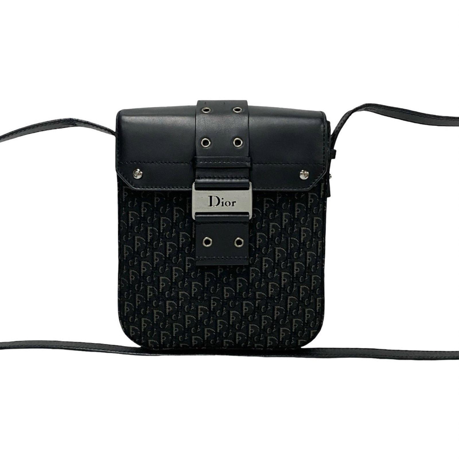 Christian Dior Shoulder Bag Leather Canvas: Christian Dior Shoulder Bag Leather Canvas This Christian Dior shoulder bag features a unique combination of leather and canvas materials in its construction. The black color provides a sleek and time