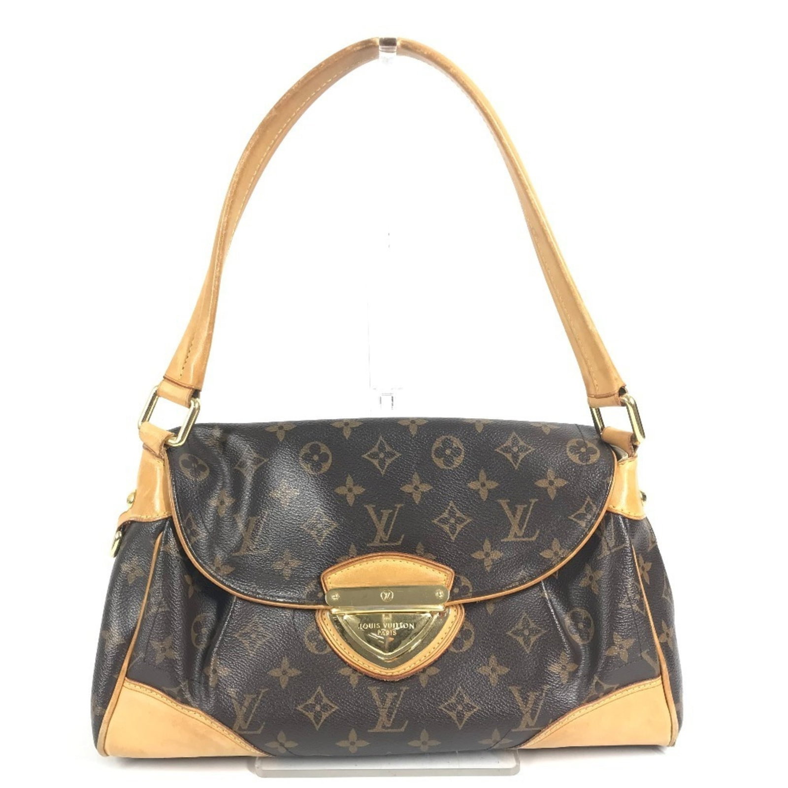 Louis Vuitton Handbag Shoulder Bag Monogram: Louis Vuitton Handbag Shoulder Bag Monogram This Louis Vuitton Handbag Shoulder Bag Monogram in brown features the iconic monogram pattern and classic design. Measuring 19.5cm x 32cm x 11.5cm, it