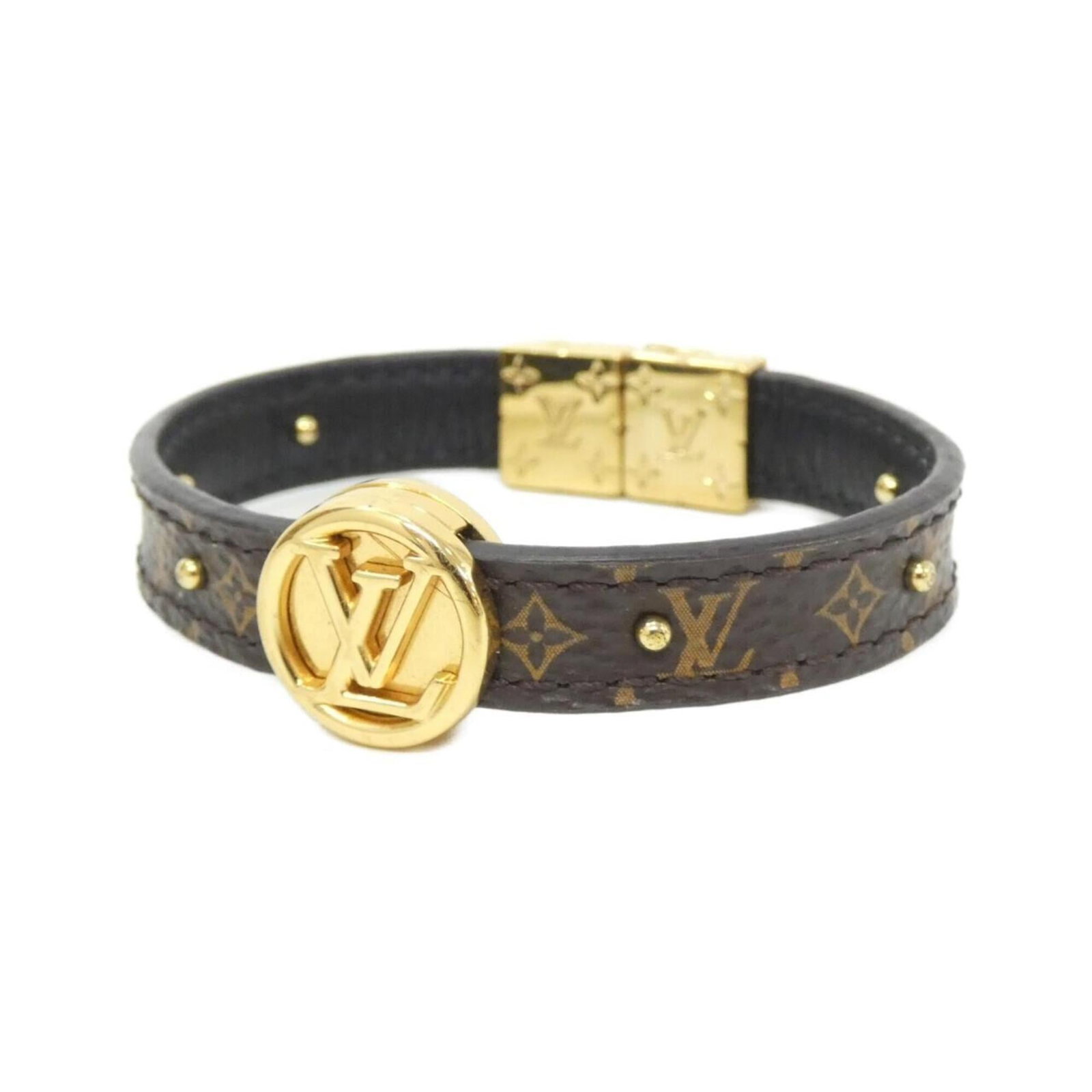 Louis Vuitton Charm Bracelet Canvas Leather: Louis Vuitton Charm Bracelet Canvas Leather Canvas and leather come together in this Louis Vuitton charm bracelet, featuring calf leather in black, gold, and marron hues. The 15.5cm length showcases a