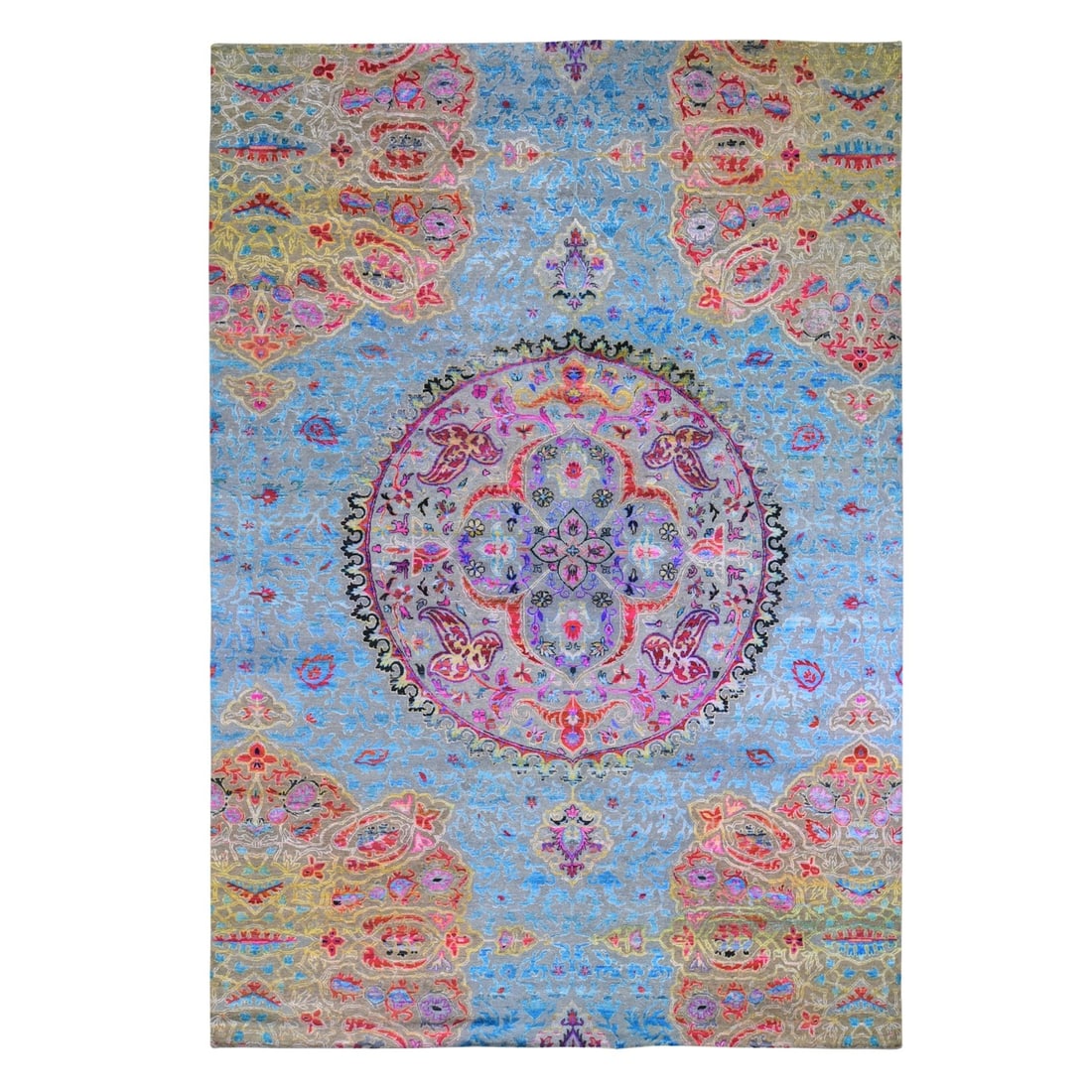 Colorful Hand Knotted Sari Silk Text Wool Maharaja Rug: Colorful Hand Knotted Sari Silk Text Wool Maharaja Rug The Colorful Hand Knotted Sari Silk Text Wool Maharaja Rug boasts an intricate Oriental design, featuring a rich blue field with vibrant accents 