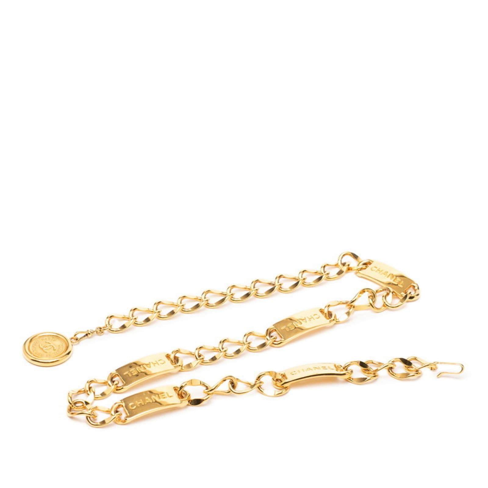 Chanel Chain Belt: Chanel Chain Belt Gold chain belt from Chanel, featuring a classic design with traces of usage and minor scratches. The belt measures 81cm in length and is in used condition, showing signs of wear. It