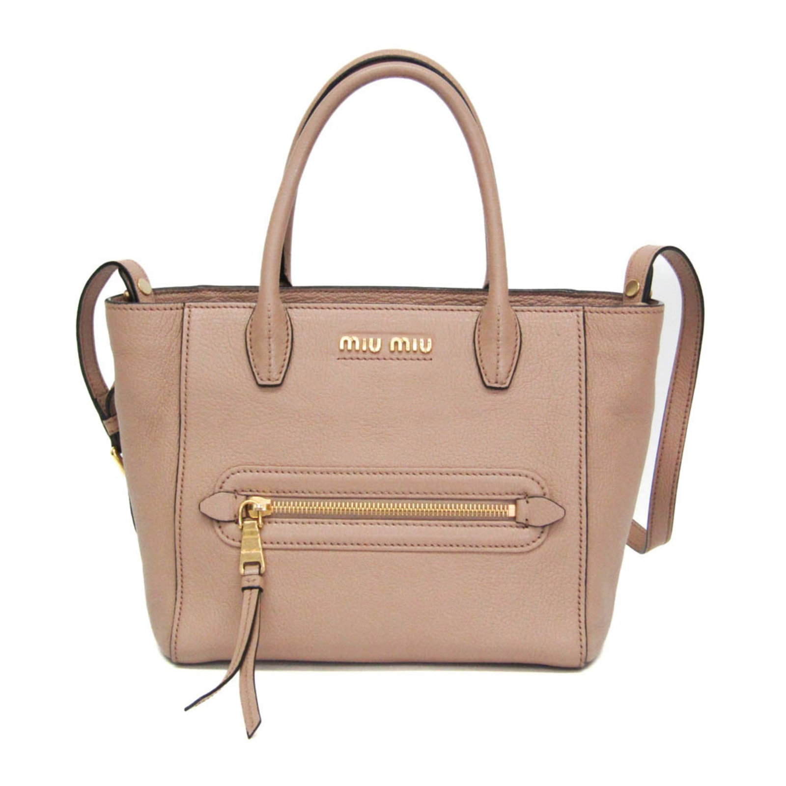 Miu Miu Handbag Shoulder Bag Leather: Miu Miu Handbag Shoulder Bag Leather This Miu Miu Handbag Shoulder Bag Leather features a beautiful pink beige color and a classic design. With its spacious interior, including a zipper pocket 1 and