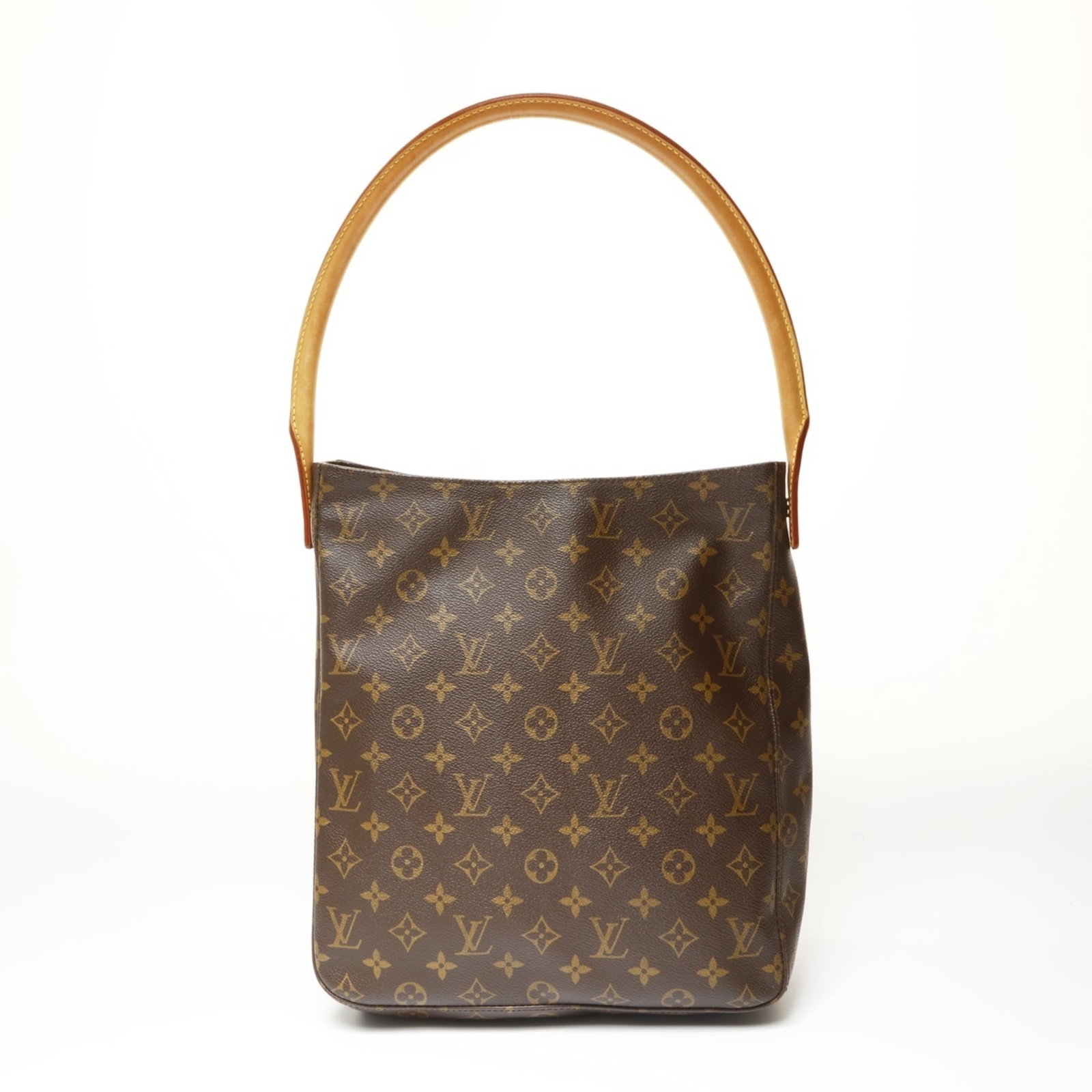 Louis Vuitton Shoulder Bag: Louis Vuitton Shoulder Bag This Louis Vuitton shoulder bag boasts its iconic monogram pattern in rich brown leather. With a classic design and timeless style, it features a spacious interior and sturd