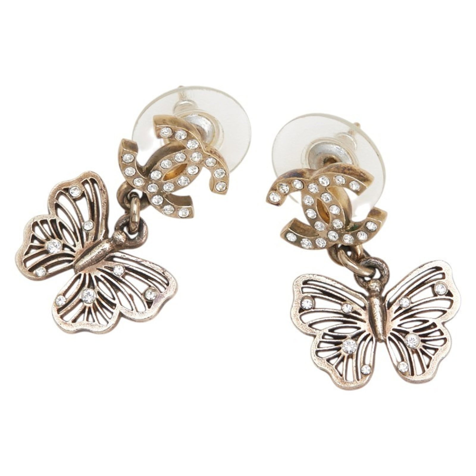 Chanel Stud Earrings: Chanel Stud Earrings Stud earrings from Chanel feature a gold finish and are made of high-quality materials. The earrings have some signs of usage, including scratches and dirt, but remain in good con