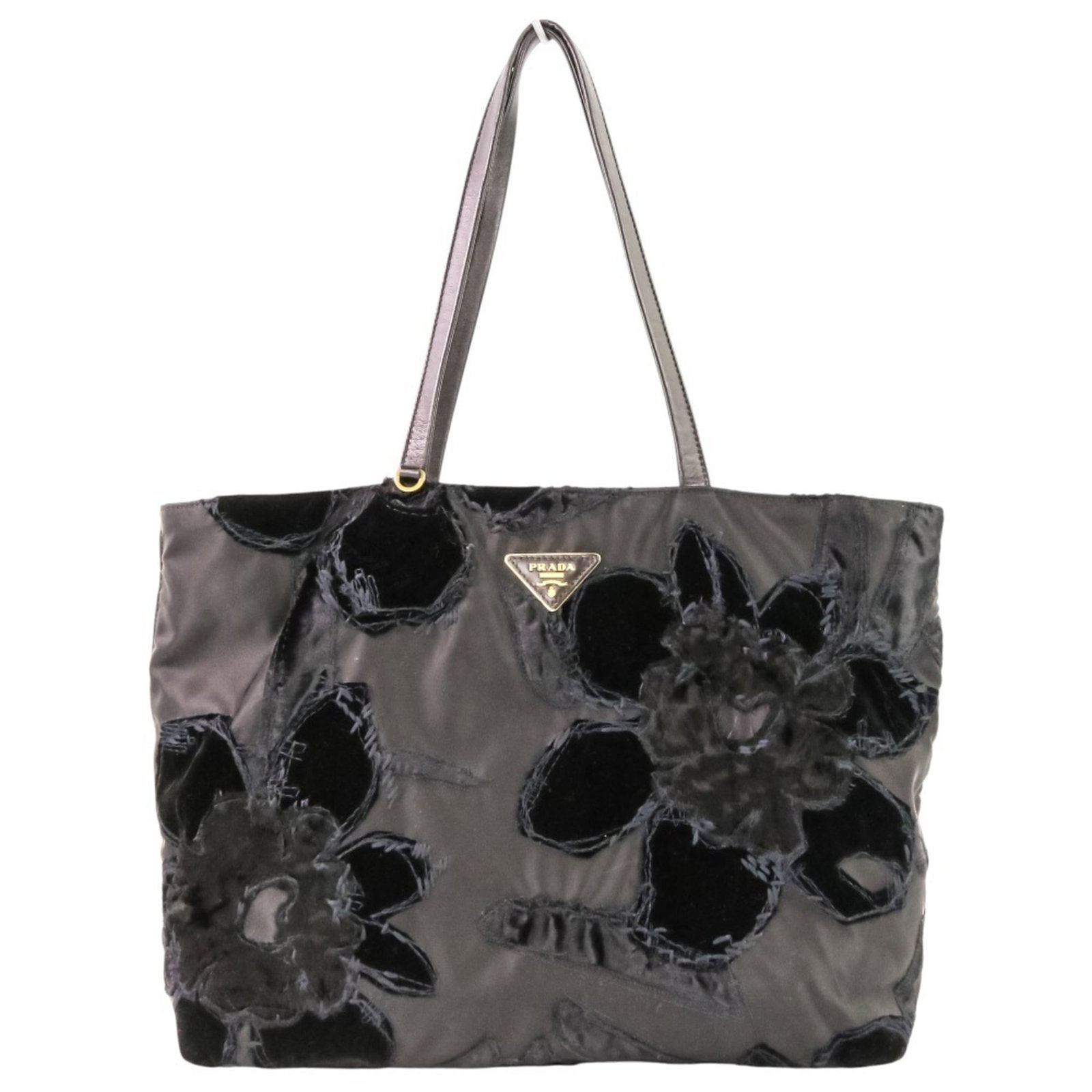 Prada Tote Bag Nylon: Prada Tote Bag Nylon Black Prada Tote Bag in excellent condition. This nylon tote features a classic design with a 53cm handle and measures 28cm x 41.5cm x 15cm. A few minor scratches and signs of wea