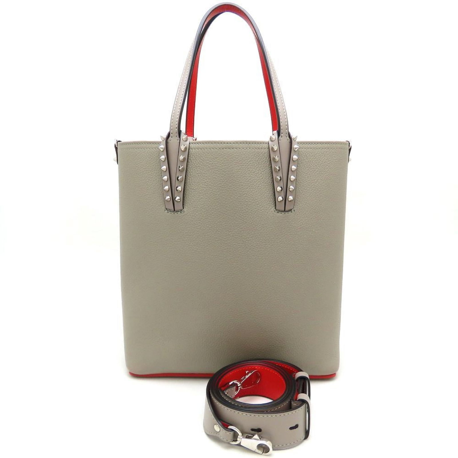 Christian Louboutin Handbag Leather: Christian Louboutin Handbag Leather Gray and red leather Christian Louboutin handbag with hook closure, featuring a classic design. The bag has some traces of usage, scratches, and dirt, but remains i