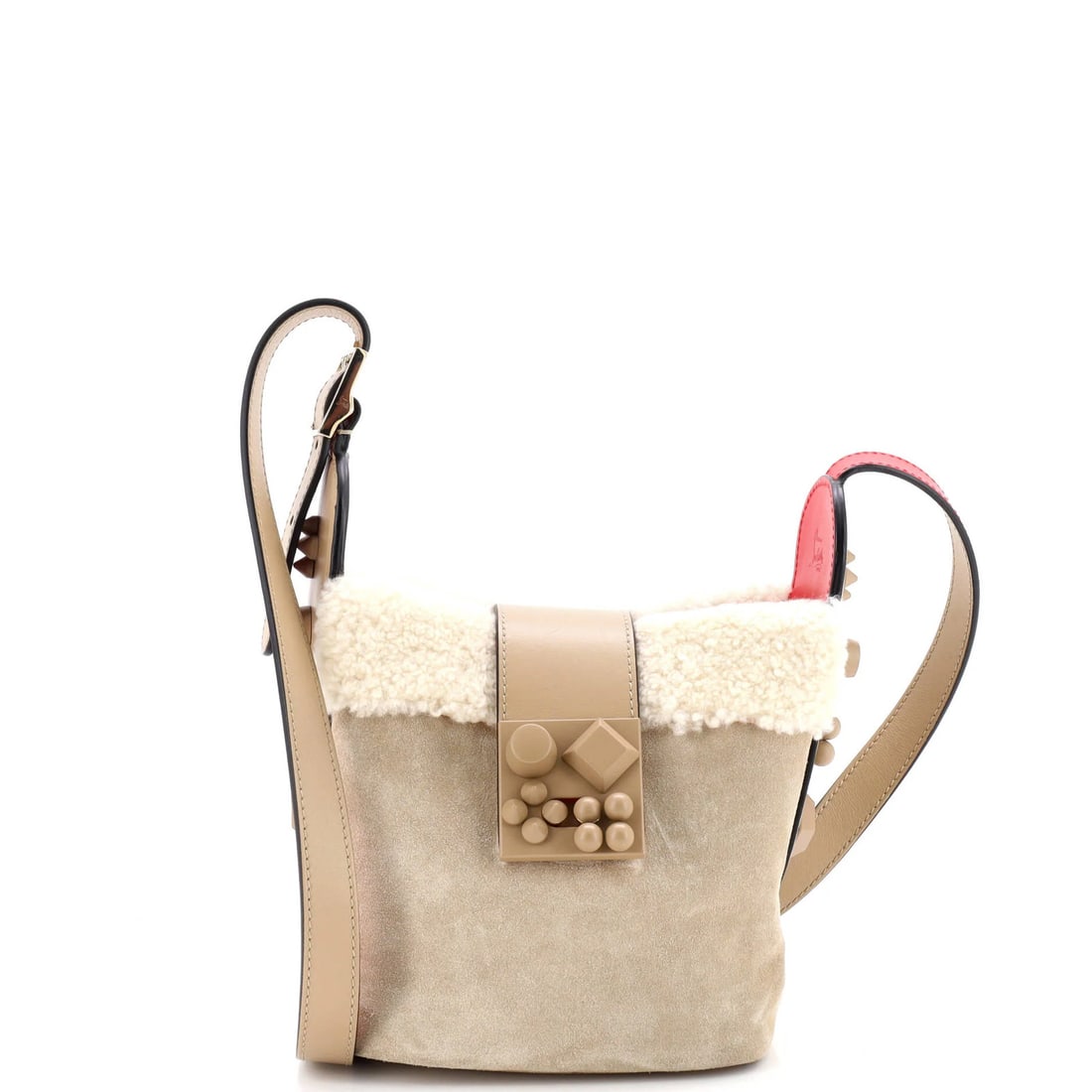 Suede mini shearling bucket bag by Christian Louboutin: Suede mini shearling bucket bag by Christian Louboutin Suede mini shearling bucket bag by Christian Louboutin features a neutral exterior made from shearling and suede, with a distinctive bucket shape