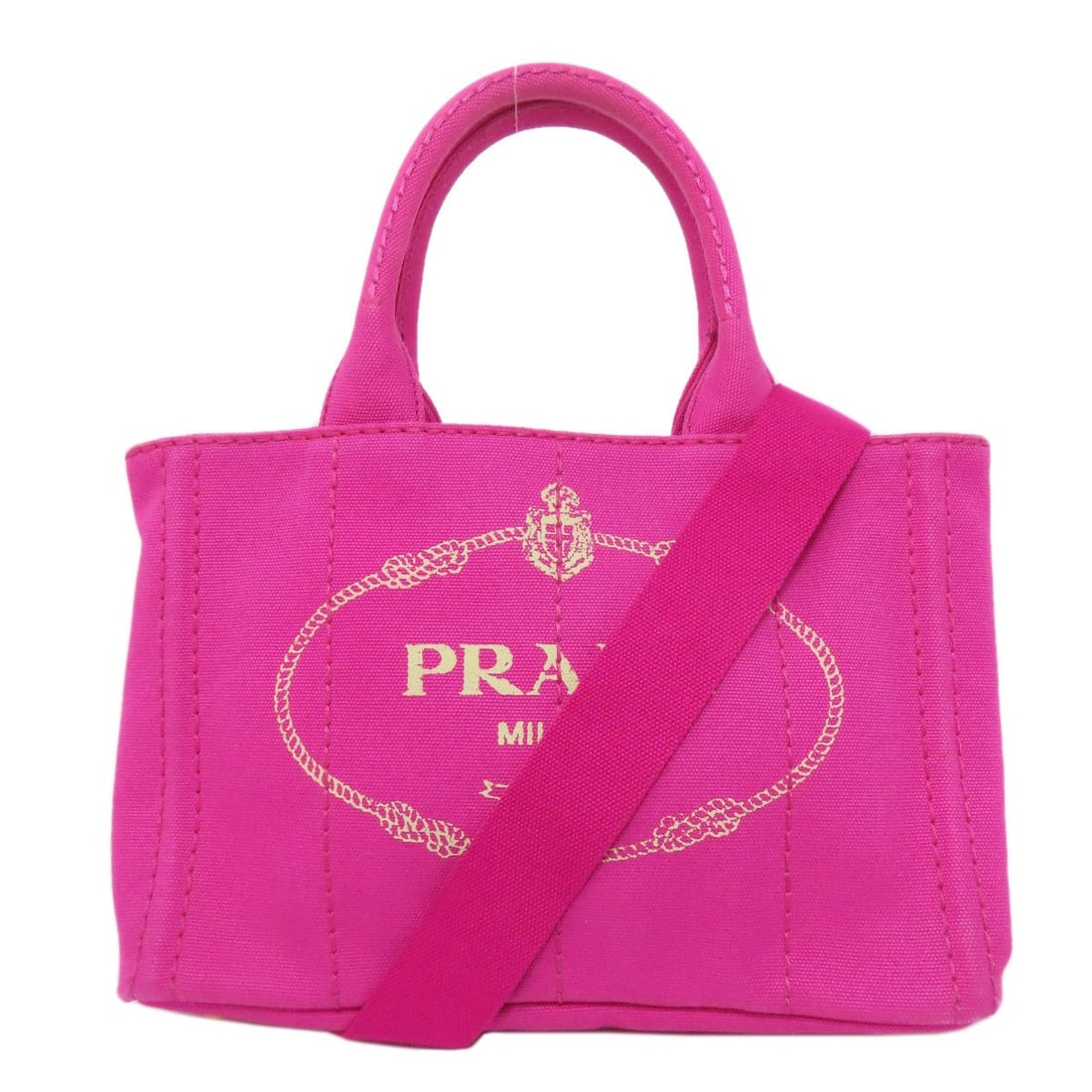 Canapa Canvas Mini Two Way Handbag Prada: Canapa Canvas Mini Two Way Handbag Prada Pink canvas handbag with Prada style. This mini two-way handbag features a notable exterior material and color combination. The design showcases a unique aesth