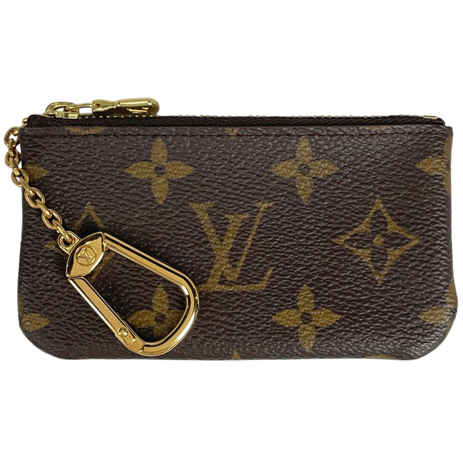 Louis Vuitton Coin Purse/Coin Case Monogram: Louis Vuitton Coin Purse/Coin Case Monogram This Louis Vuitton Coin Purse/Coin Case Monogram features the iconic brand's signature brown monogram pattern. With its classic design and durable construct