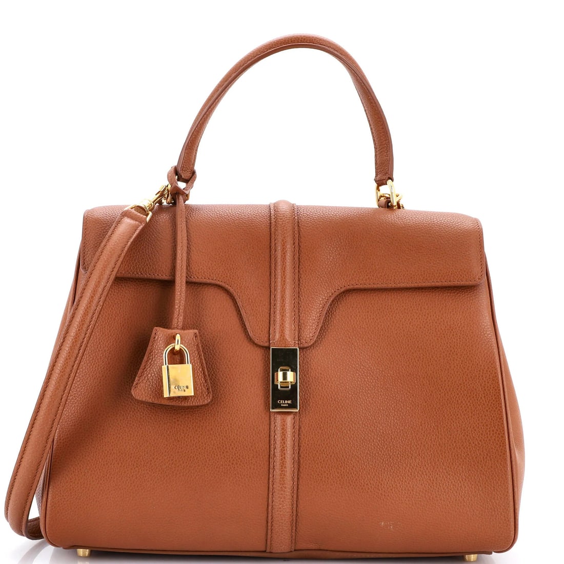 Calfskin bag with top handle medium grain: Calfskin bag with top handle medium grain Calfskin bag with top handle medium grain. This Celine shoulder bag features heavy corner wear, scuffs, and edge wear, giving it a unique, pre-loved look.