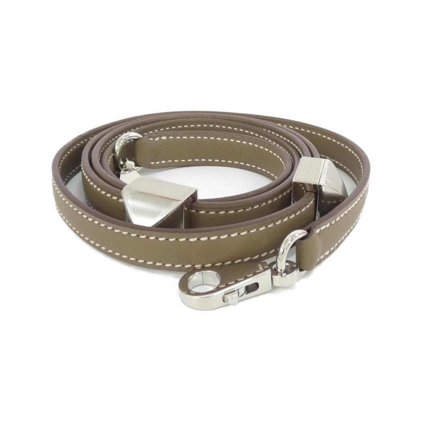 Hermes Strap Swift Leather: Hermes Strap Swift Leather Swift Leather strap from Hermes, featuring a subtle Etoupe Gray color. This used strap shows some signs of wear, including scratches and dirt, but remains in very good condi