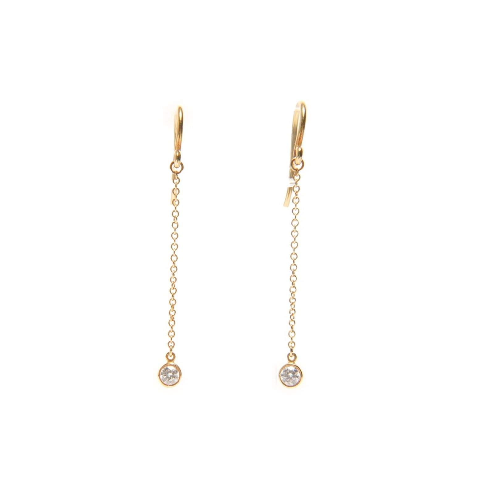 Tiffany Drop Earrings Yellow Gold (18K): Tiffany Drop Earrings Yellow Gold (18K) Tiffany's iconic Drop Earrings shine in 18K yellow gold, adorned with a sparkling diamond. The elegant design features a subtle drop shape and measures approxim
