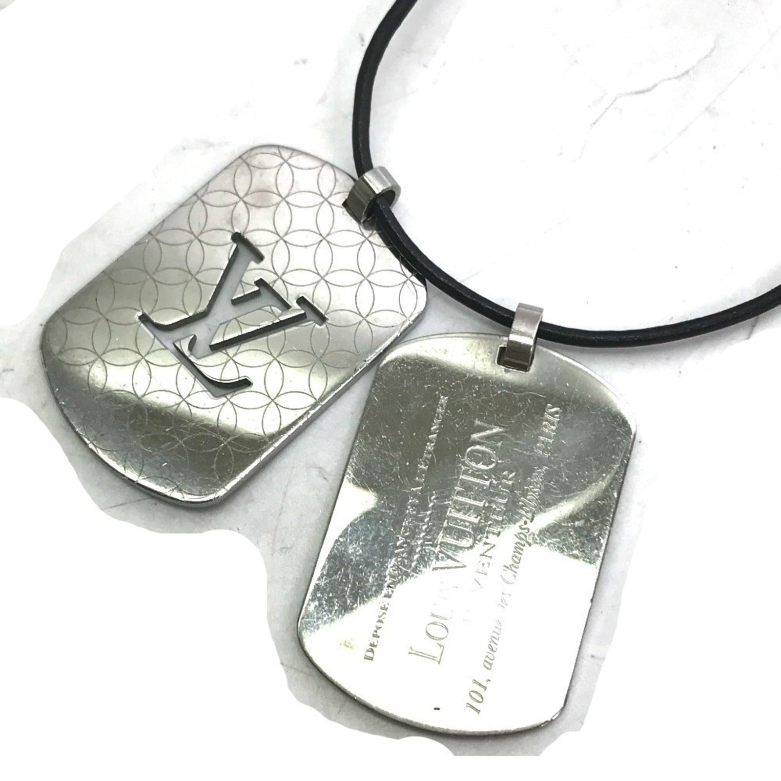 Louis Vuitton M65453 Pendant Champs Elysees Gm Leather Cord Necklace Ss Men'S Silver: Louis Vuitton M65453 Pendant Champs Elysees Gm Leather Cord Necklace Ss Men'S Silver Stainless steel pendant with a classic Louis Vuitton design, measuring 42mm x 28mm, features a silver finish and co