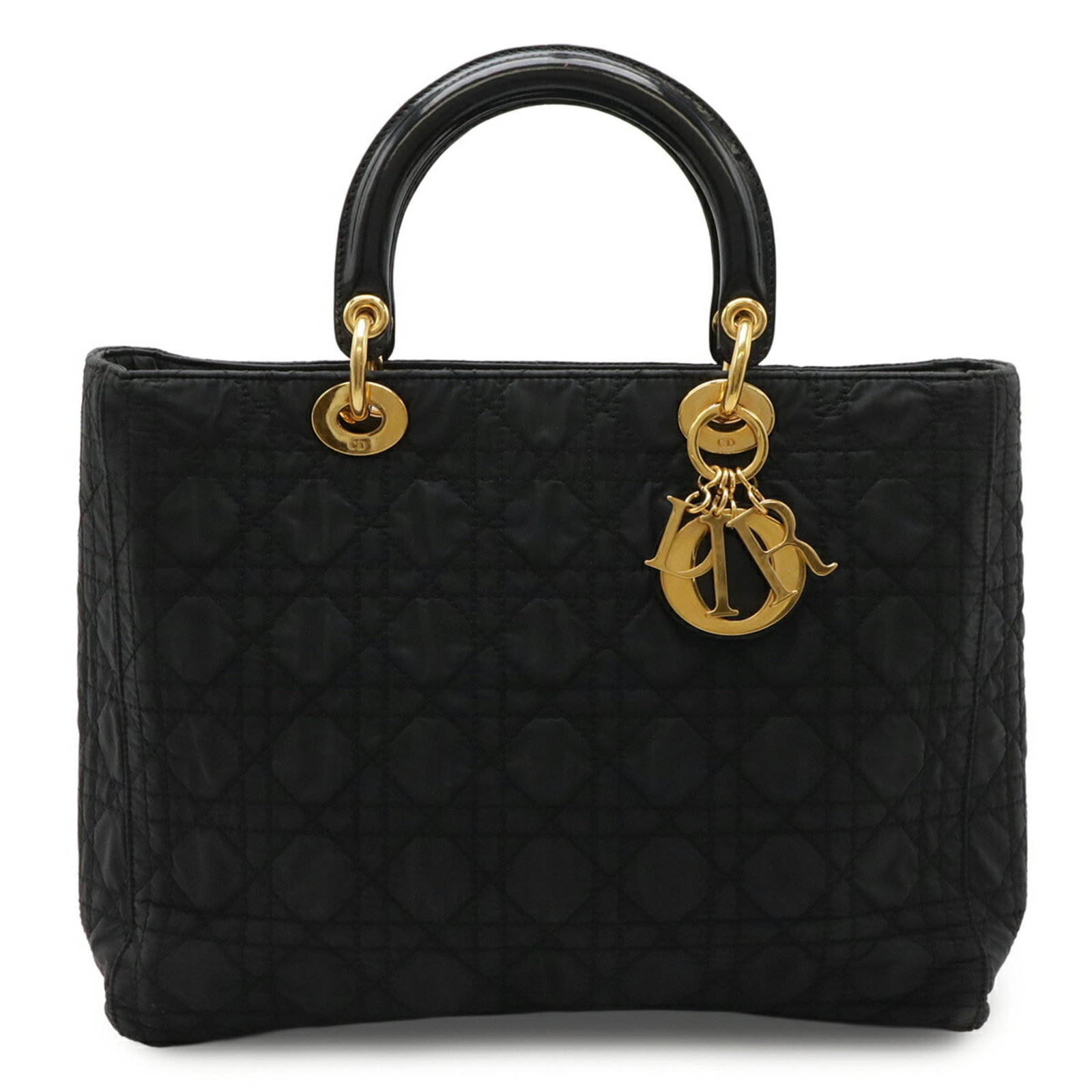 Christian Dior Handbag Tote Bag Nylon Patent Leather: Christian Dior Handbag Tote Bag Nylon Patent Leather Black Christian Dior Handbag Tote Bag made from Nylon and Patent Leather features a sleek design with visible traces of usage. The bag measures 25c