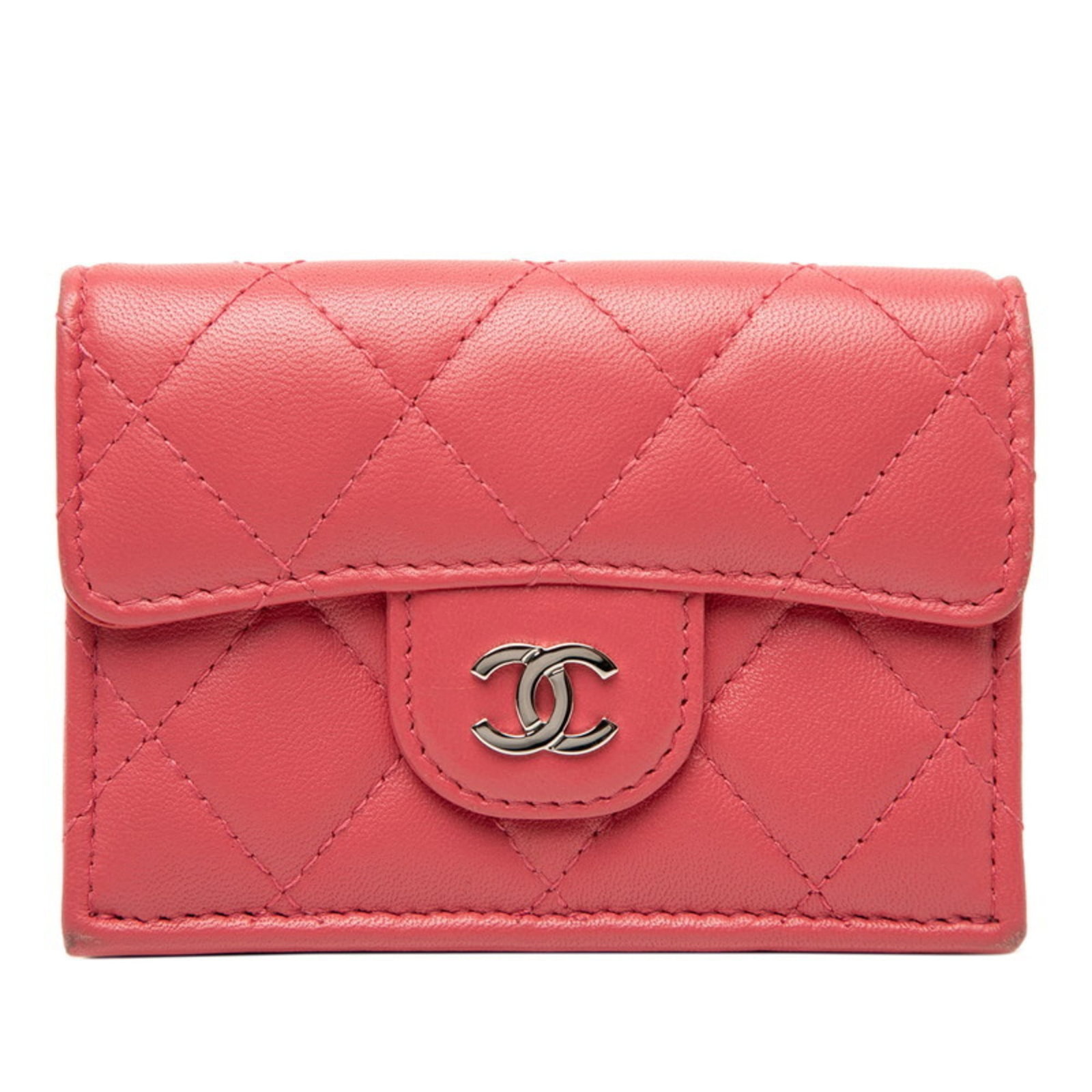 Chanel Wallet (Tri-Fold) Leather: Chanel Wallet (Tri-Fold) Leather This Chanel Tri-Fold Wallet features luxurious lambskin leather in a beautiful pink hue. With its classic tri-fold design and timeless style, this wallet exudes