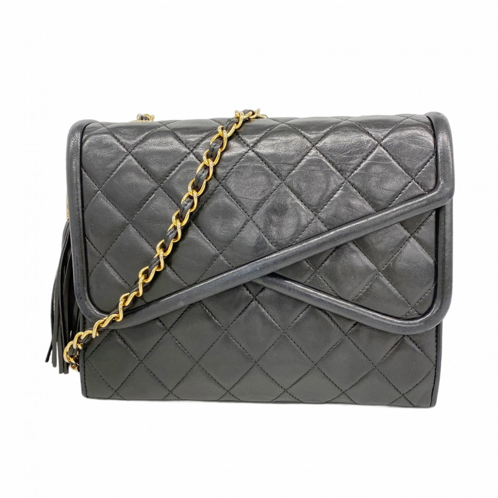 Chanel Shoulder Bag Leather: Chanel Shoulder Bag Leather This luxurious Chanel shoulder bag features high-quality lambskin leather in black, adorned with gold hardware for a touch of sophistication. With its classic design and