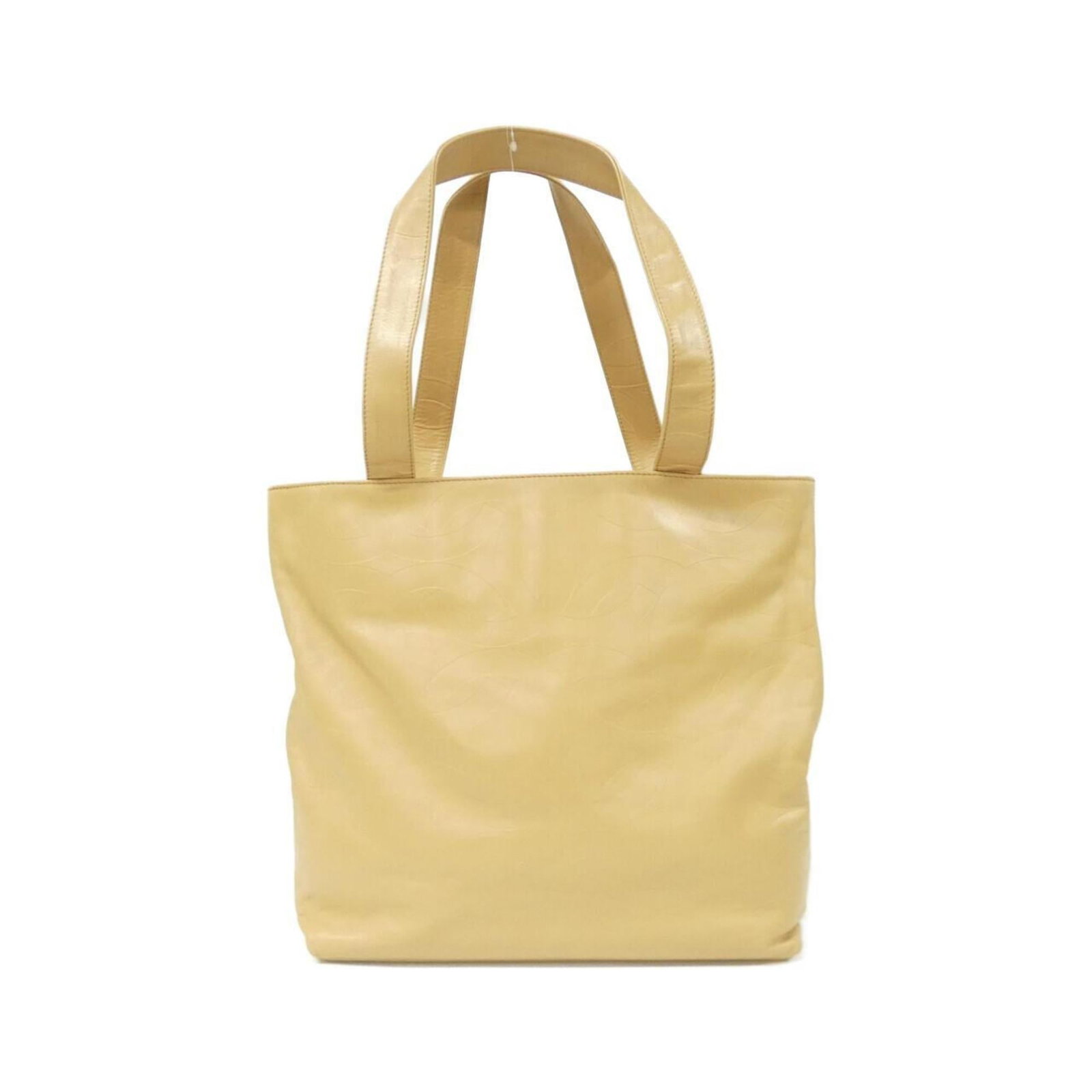 Chanel Handbag Leather: Chanel Handbag Leather Beige Chanel Handbag Leather for sale. This used handbag features high-quality leather construction with some minor scratches and dirt, still in very good condition. Measuring 3