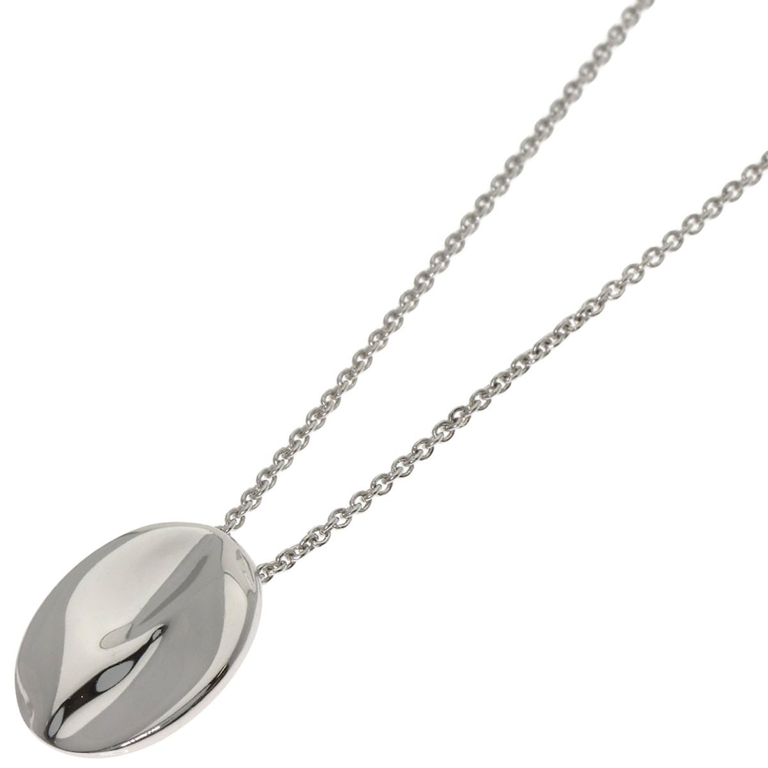 Madonna Necklace Tiffany Co Platinum: Madonna Necklace Tiffany Co Platinum Tiffany & Co.'s platinum necklace boasts a sleek design with no central stone. Measuring 15.7 inches in length, this piece showcases the luxury of platinum PT950 m