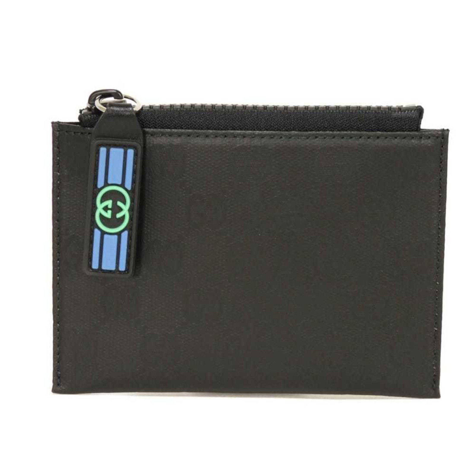 Gucci Coin Purse/Coin Case Gg Canvas: Gucci Coin Purse/Coin Case Gg Canvas Gucci's Coin Purse/Coin Case Gg Canvas is a sleek and functional accessory featuring a black canvas exterior with a zipper closure. The compact design includes an