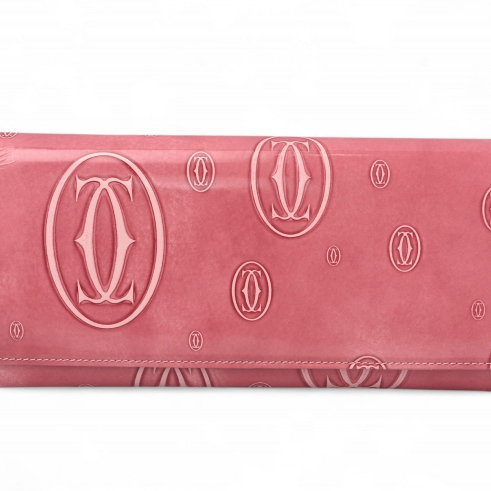 Cartier Long Wallet (Bi-Fold) Leather: Cartier Long Wallet (Bi-Fold) Leather The Cartier Long Wallet (Bi-Fold) Leather features a classic design with a pink leather exterior and a bi-fold layout. This used item has some traces of usage,