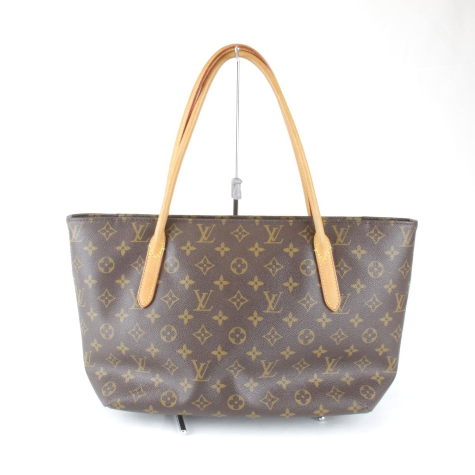 Louis Vuitton Tote Bag Monogram: Louis Vuitton Tote Bag Monogram Brown Louis Vuitton Monogram Tote Bag with Traces of Usage. This classic tote features the iconic monogram pattern and has a sturdy zipper closure. With its spacious in