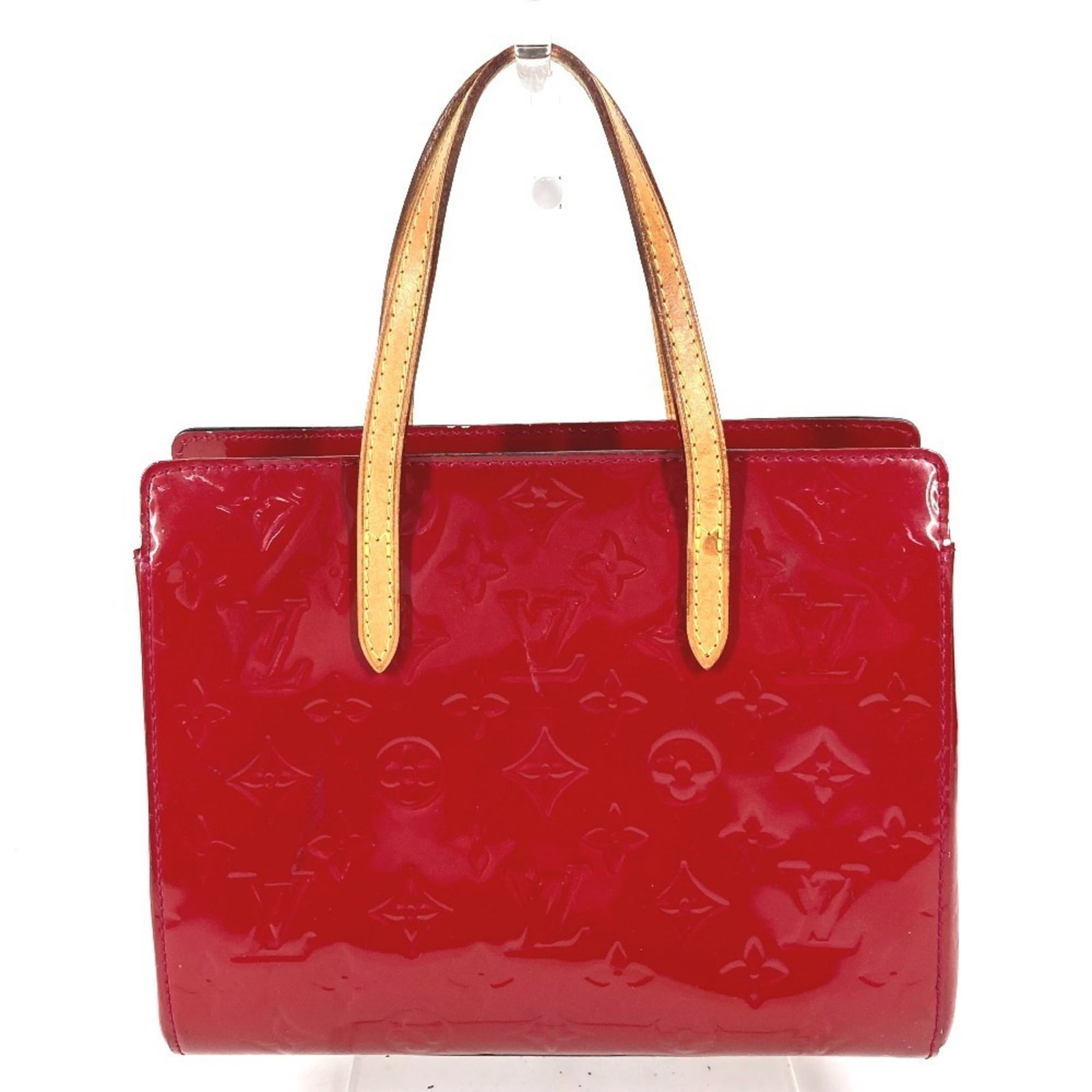 Louis Vuitton Handbag Tote Bag Monogram Vernis Canvas: Louis Vuitton Handbag Tote Bag Monogram Vernis Canvas The Louis Vuitton Handbag Tote Bag Monogram Vernis Canvas features a timeless design with iconic Indian Rose and Red monogram patterns. Made from