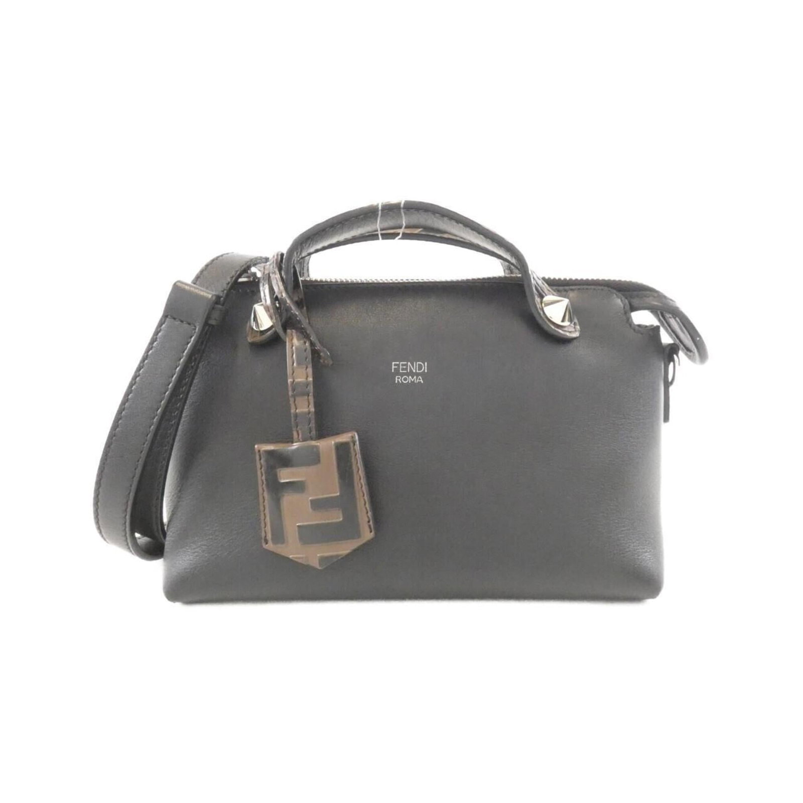 Fendi Handbag Leather: Fendi Handbag Leather This luxurious Fendi handbag features rich black calfskin leather, showcasing its classic design and timeless elegance. With its substantial size and sturdy construction, this ba