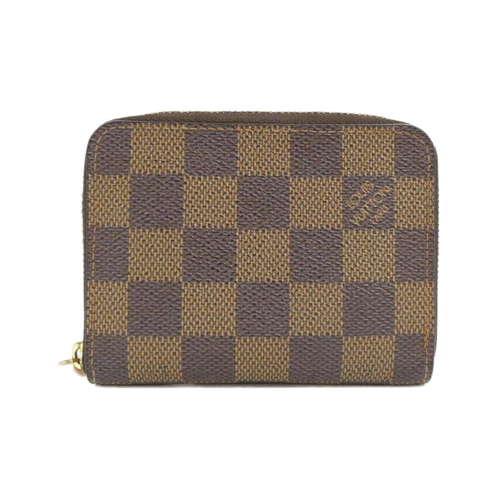Louis Vuitton Coin Purse/Coin Case Coated Canvas: Louis Vuitton Coin Purse/Coin Case Coated Canvas Coated canvas Louis Vuitton coin purse features Ebene color and measures 9cm x 11cm x 2cm. A few traces of usage are present, with some scratches and d